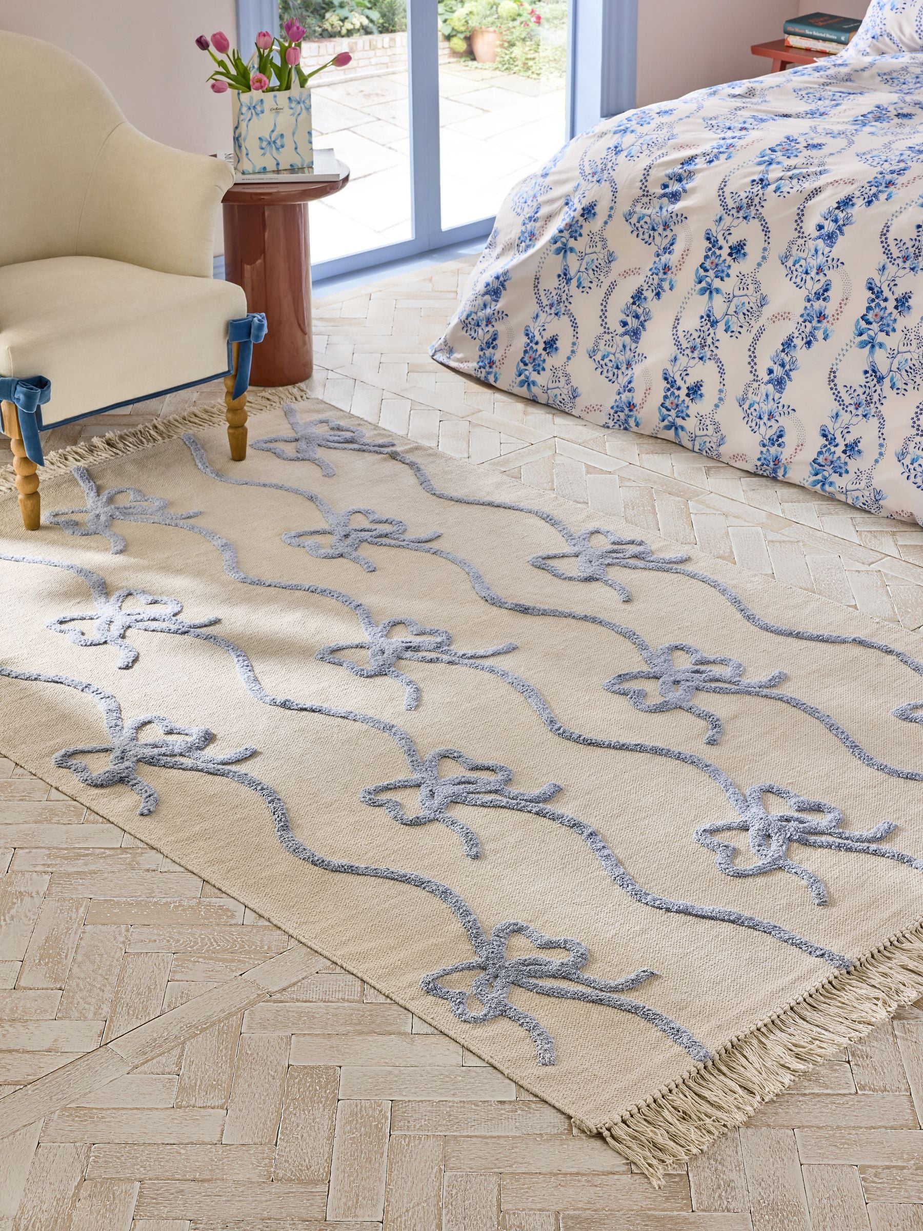 Cath Kidston blue ribbon and bows rug, imported from the UK