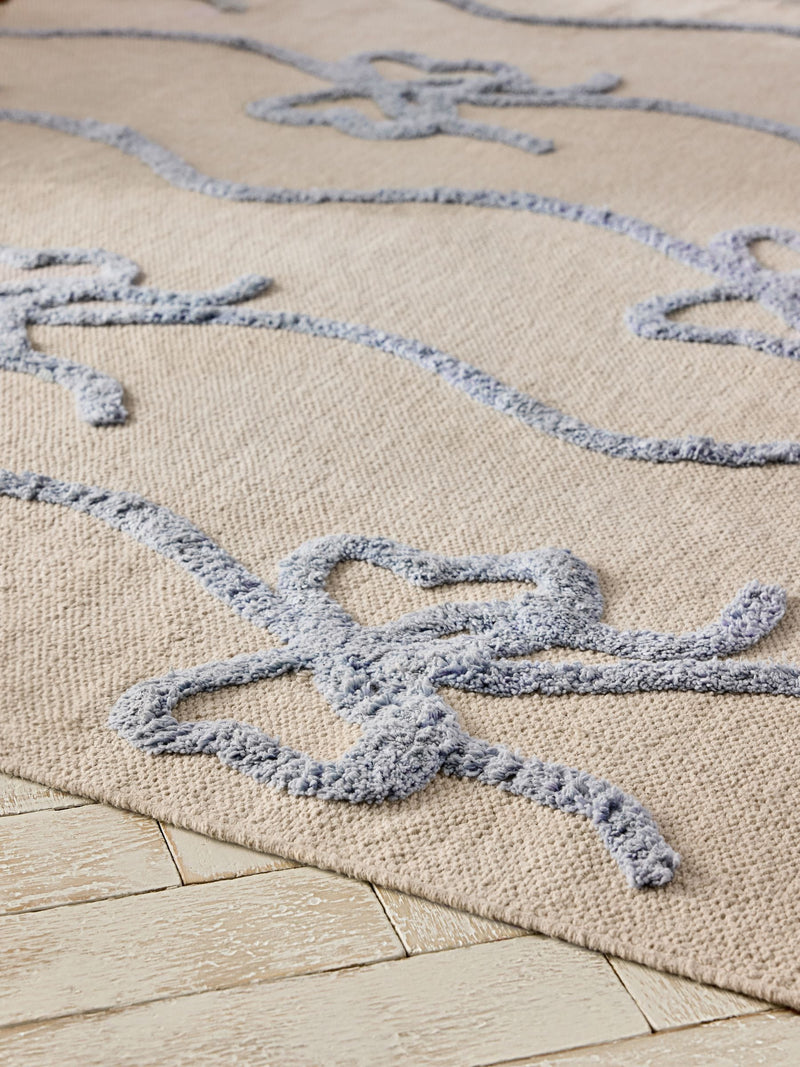 Cath Kidston blue ribbon and bows rug, imported from the UK
