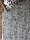 Rockett St George black dotty tufted rug, UK version