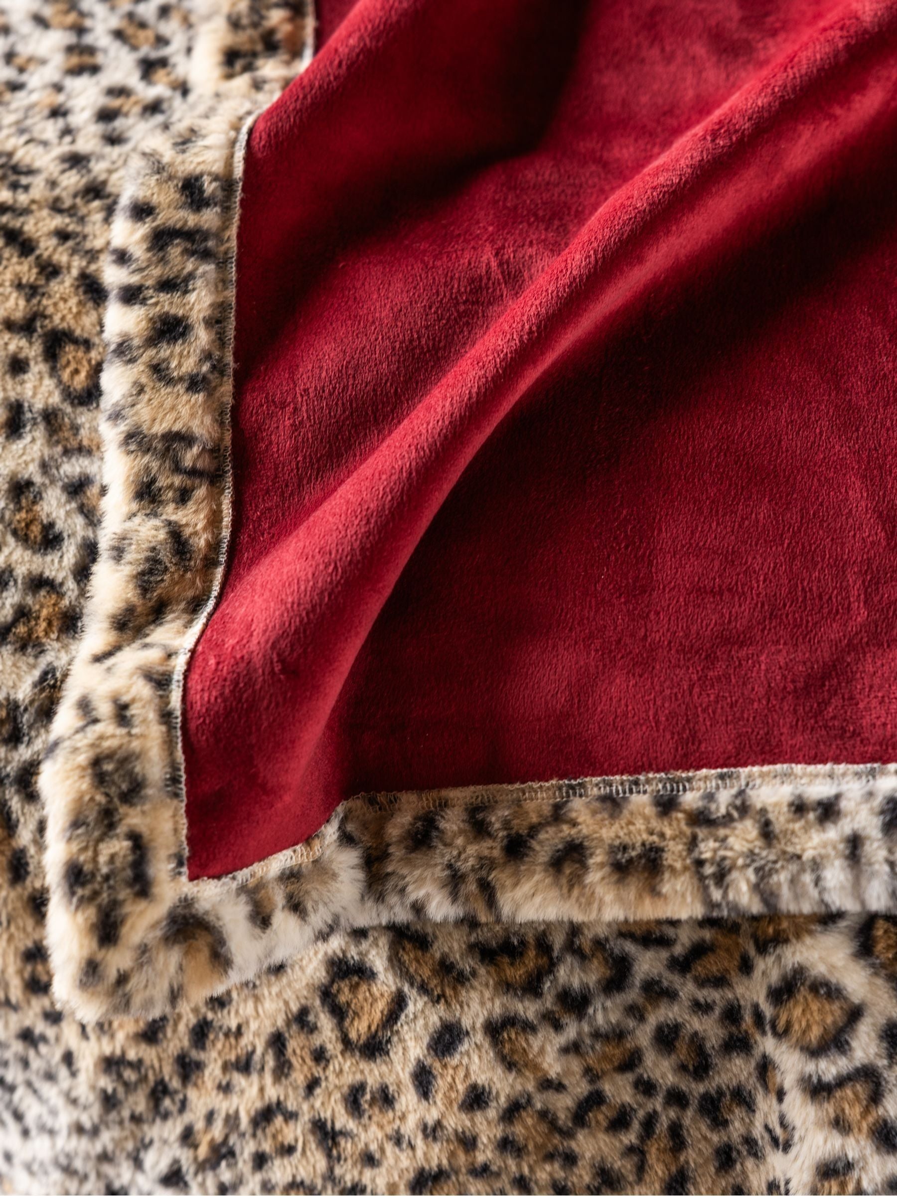 Rockett St George burgundy faux fur throw, imported from the UK