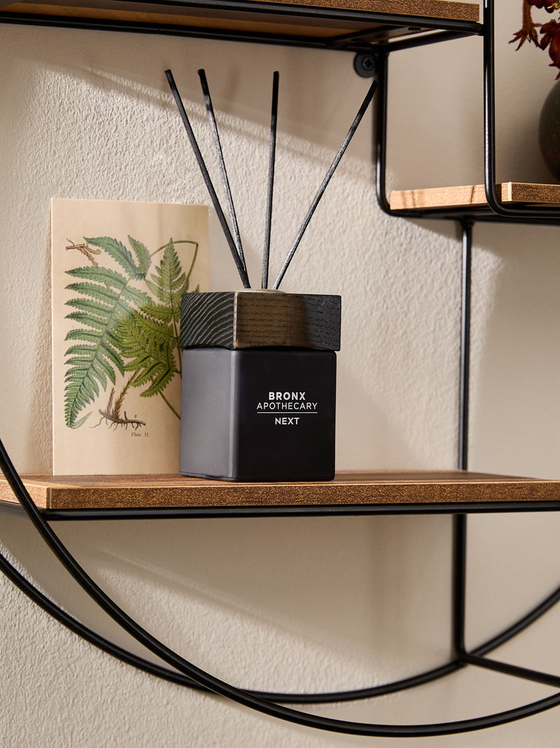 Bronx round wall shelf in dark finish 55cm - British product