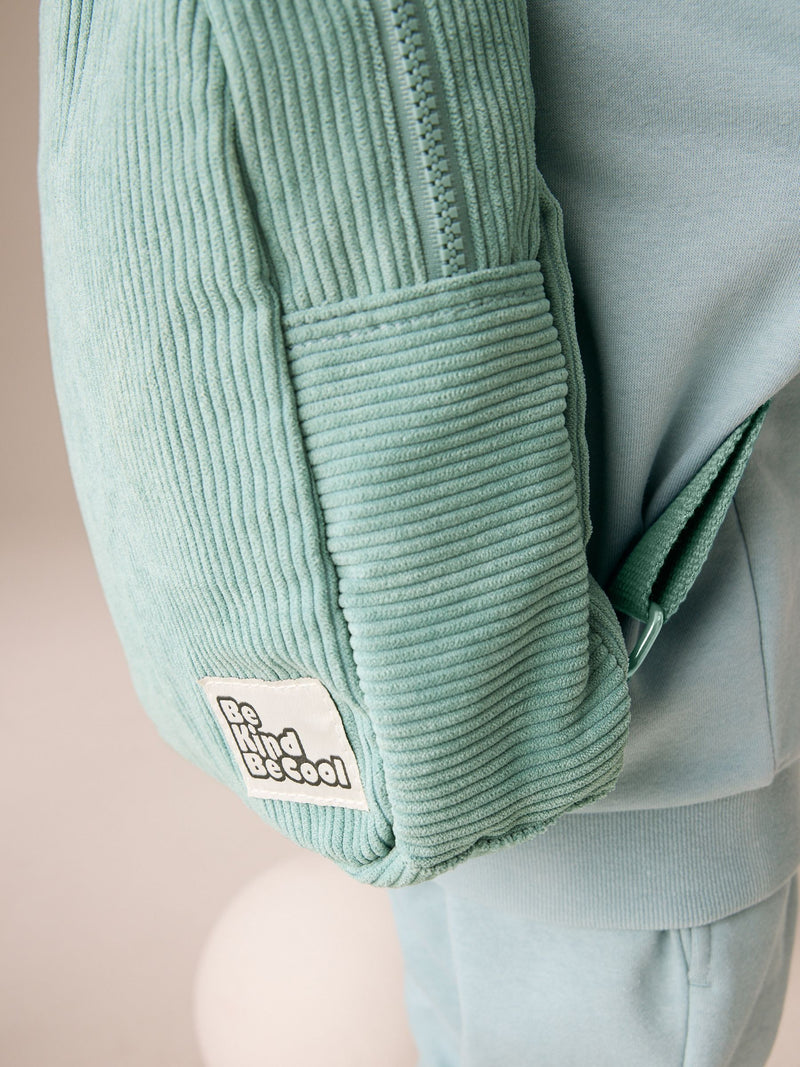 Sage green corduroy colour block backpack (British brand)