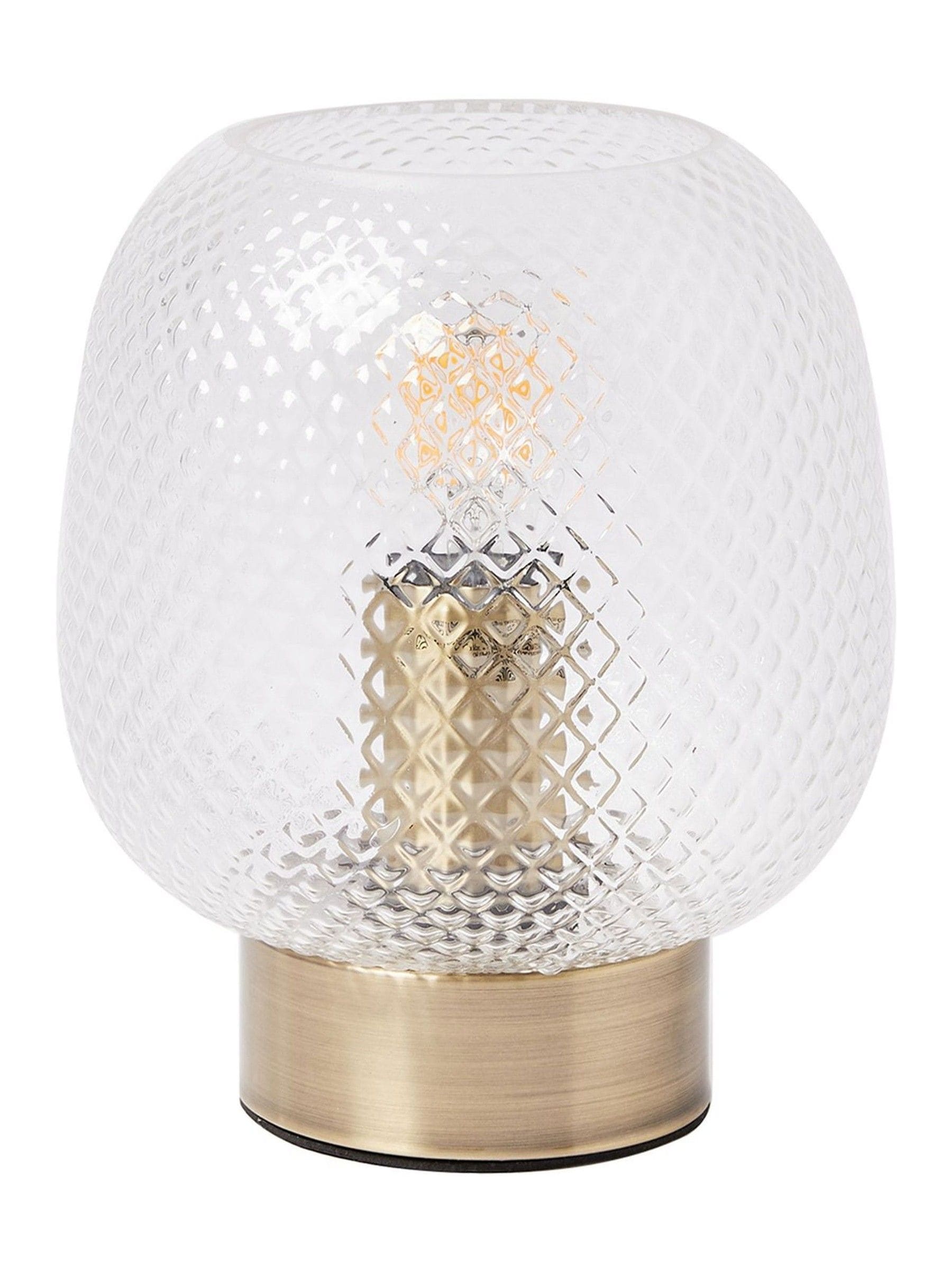 Oliver Bonas table lantern with textured glass shade and brass base, imported from the UK