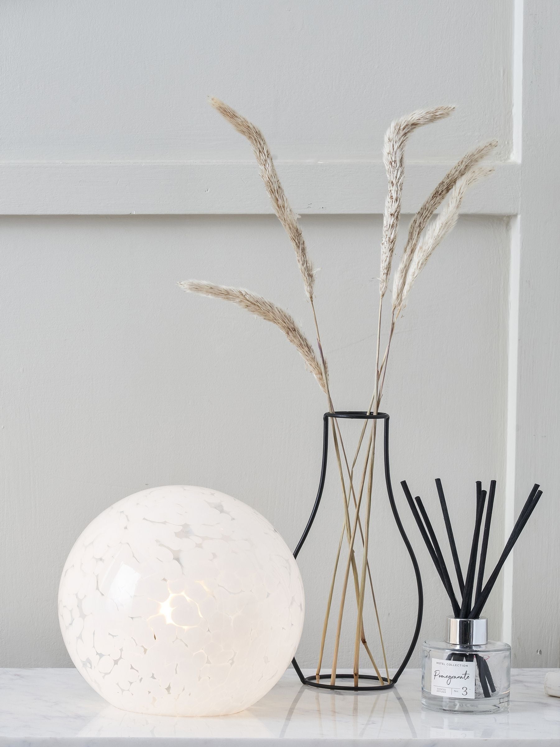Pacific white speckled glass spherical table lamp (British brand)