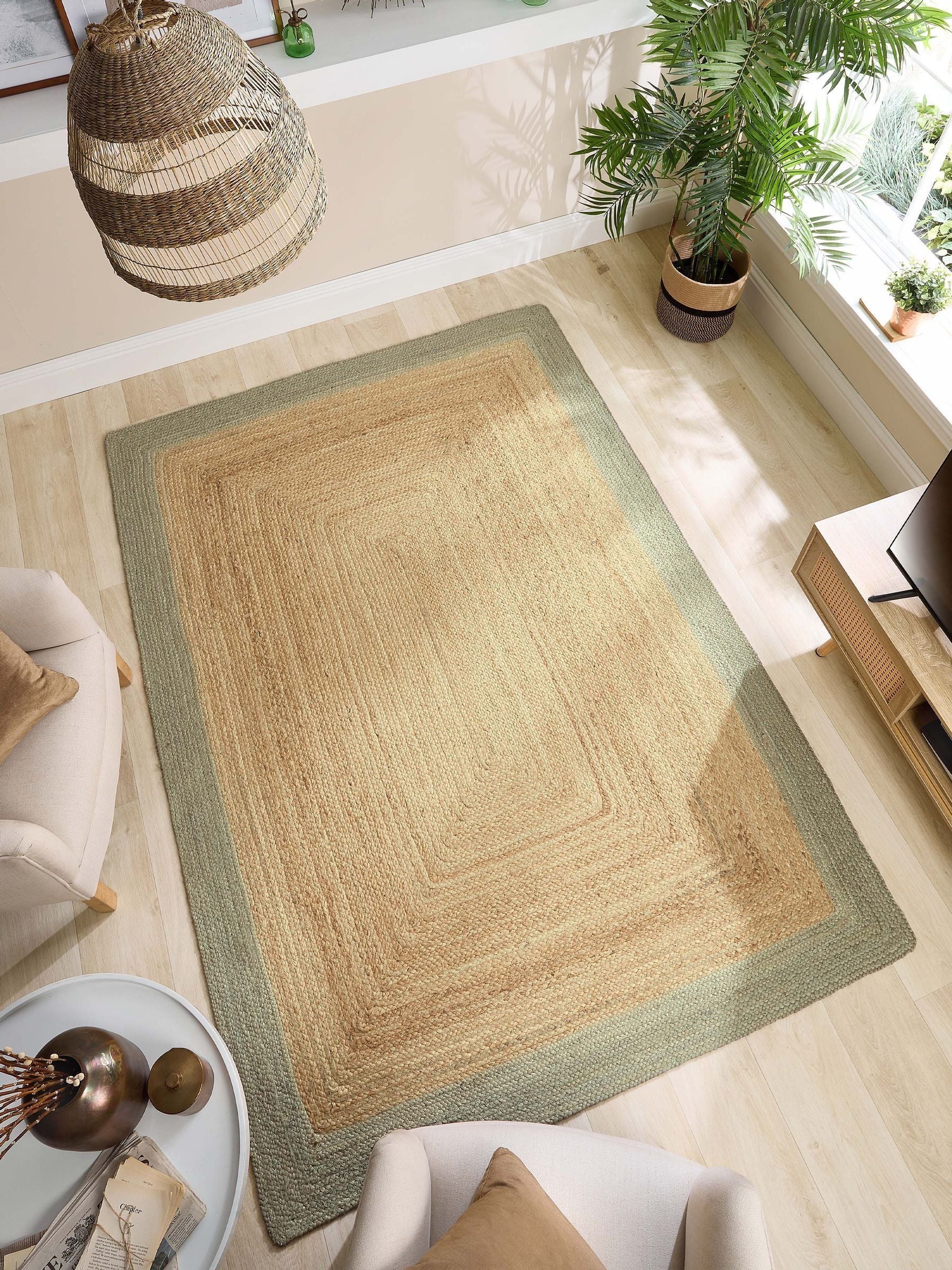 Origin Rugs jute rug with green border, imported from the UK