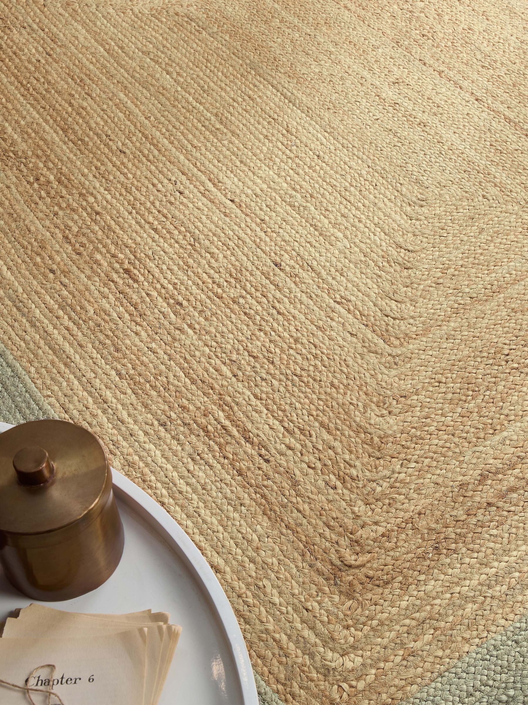 Origin Rugs jute rug with green border, imported from the UK