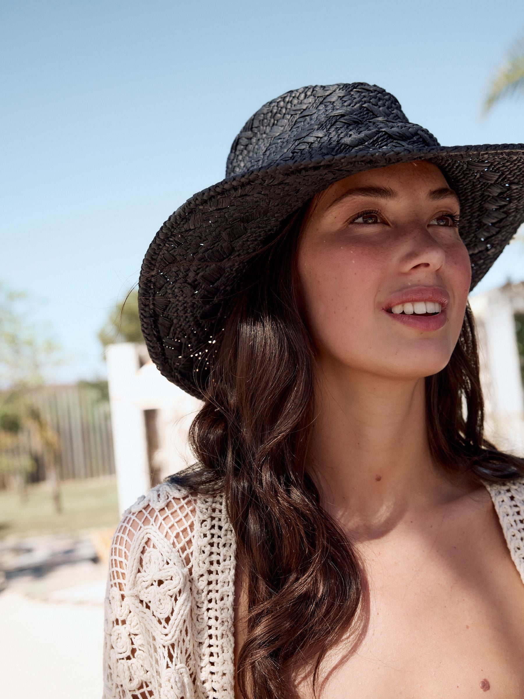 Black western straw-look hat with beaded trim and wide brim - British product