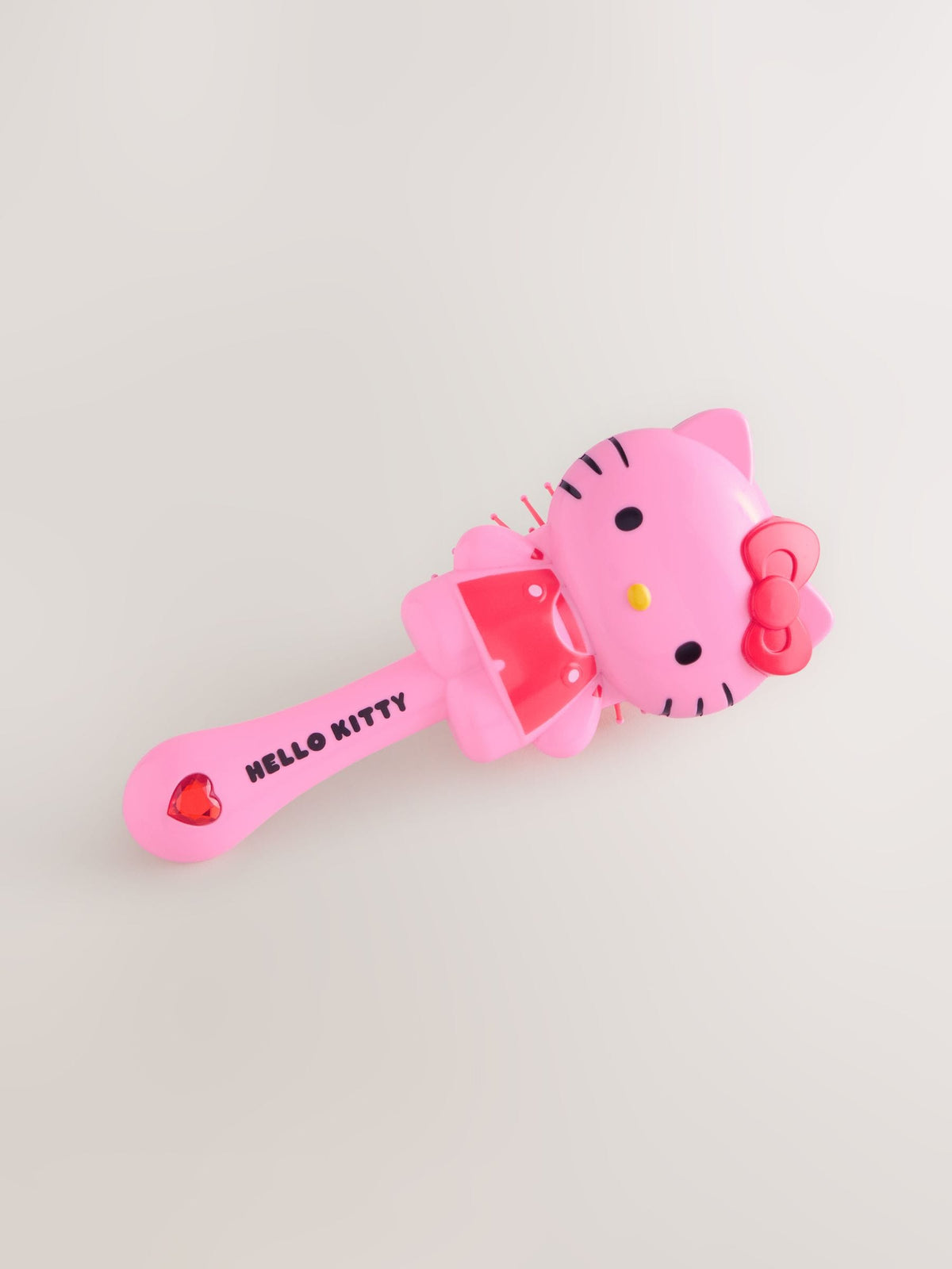 Pink Hello Kitty plastic hairbrush for children - British product