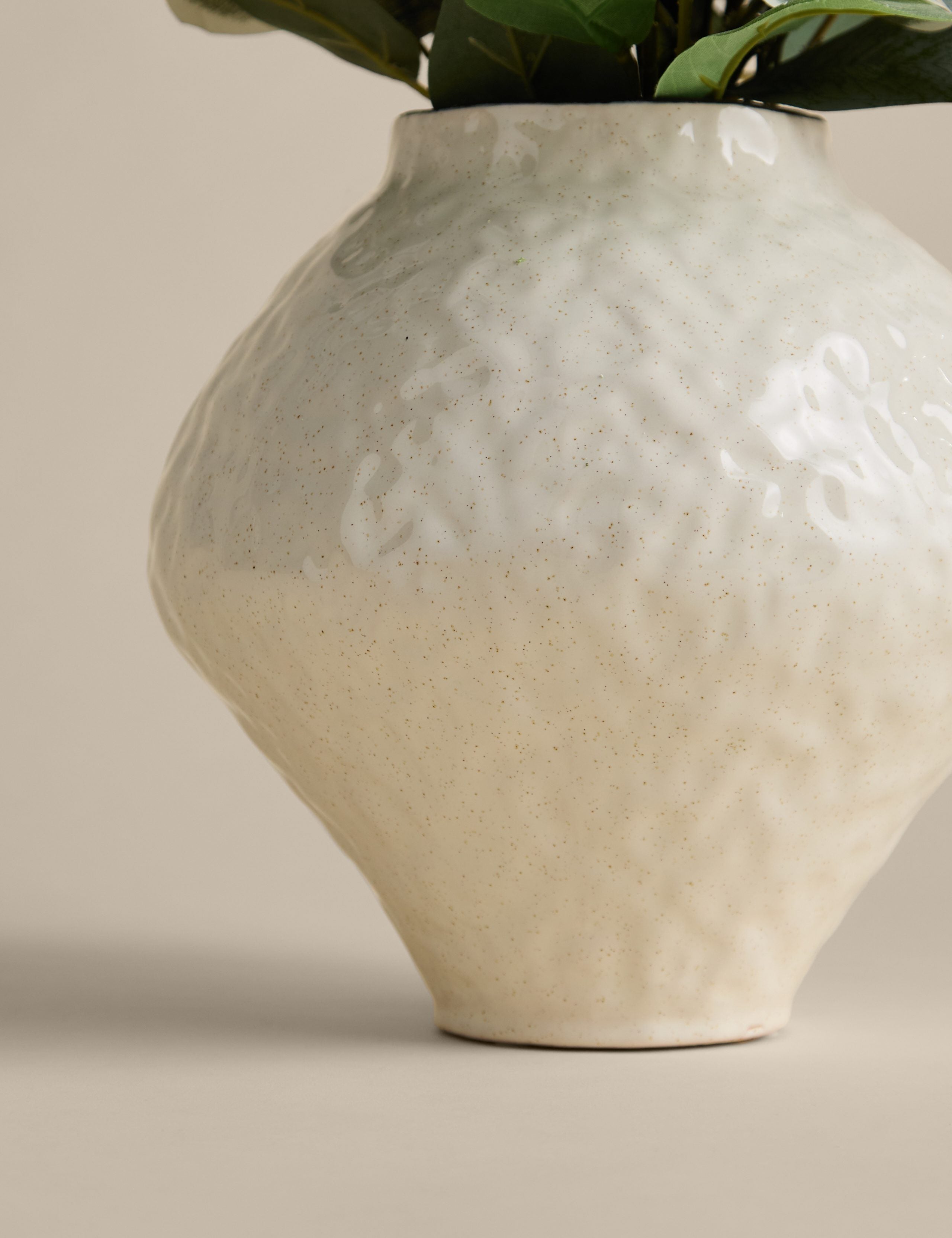 Large artificial eucalyptus arrangement in a ceramic vase, imported from the UK