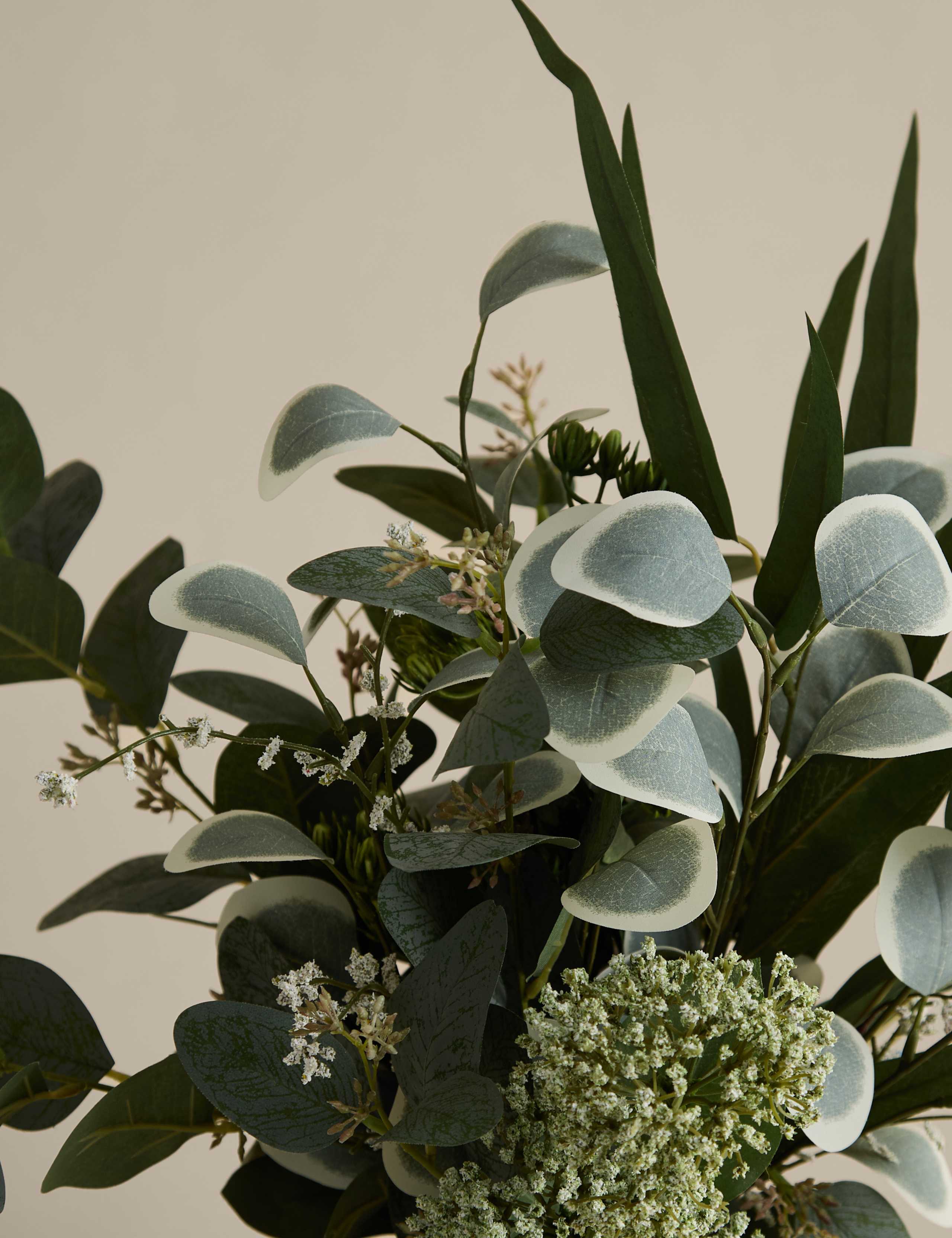 Large artificial eucalyptus arrangement in a ceramic vase, imported from the UK
