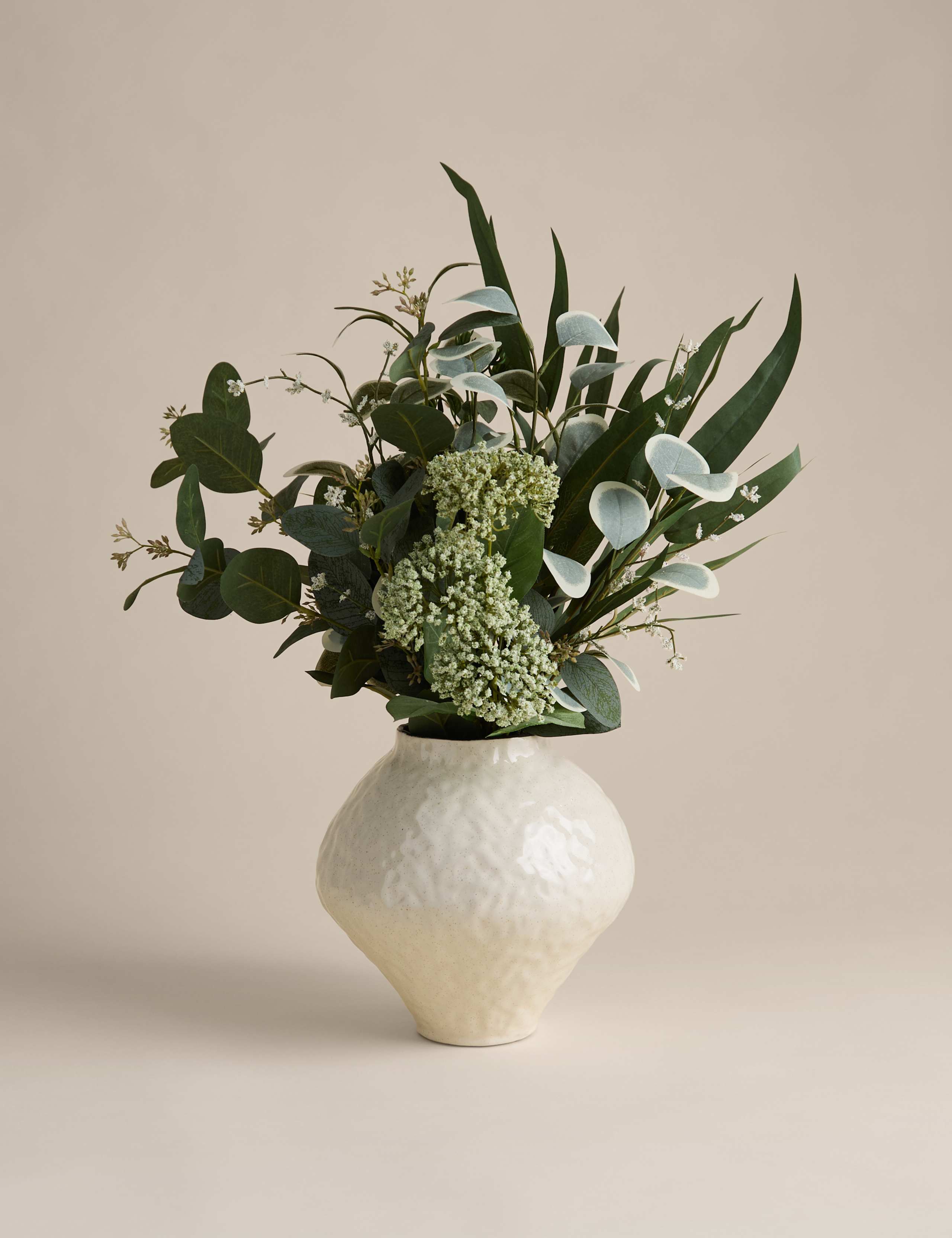Large artificial eucalyptus arrangement in a ceramic vase, imported from the UK