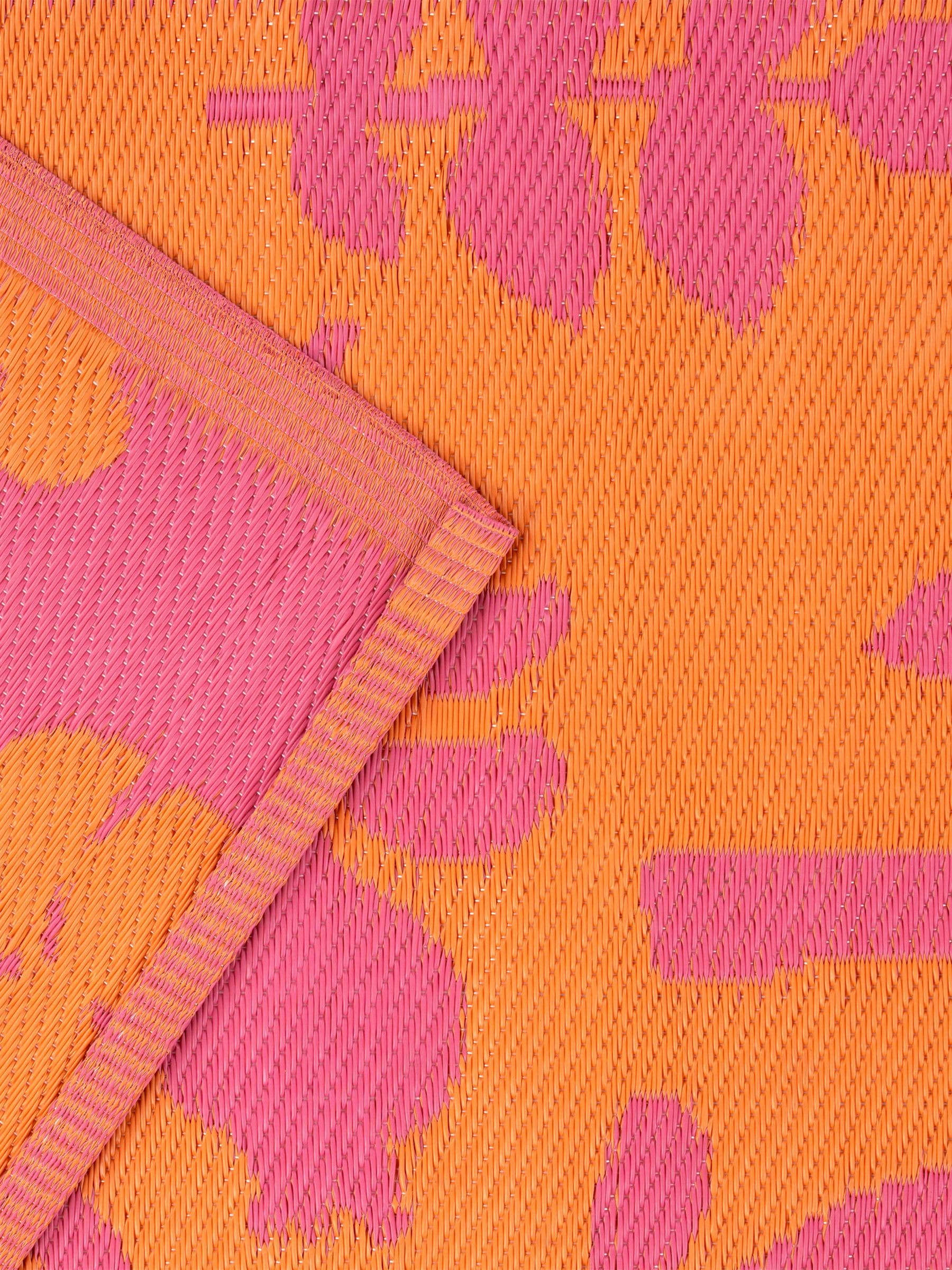 Furn Marula tropical outdoor rug in orange pink, UK version