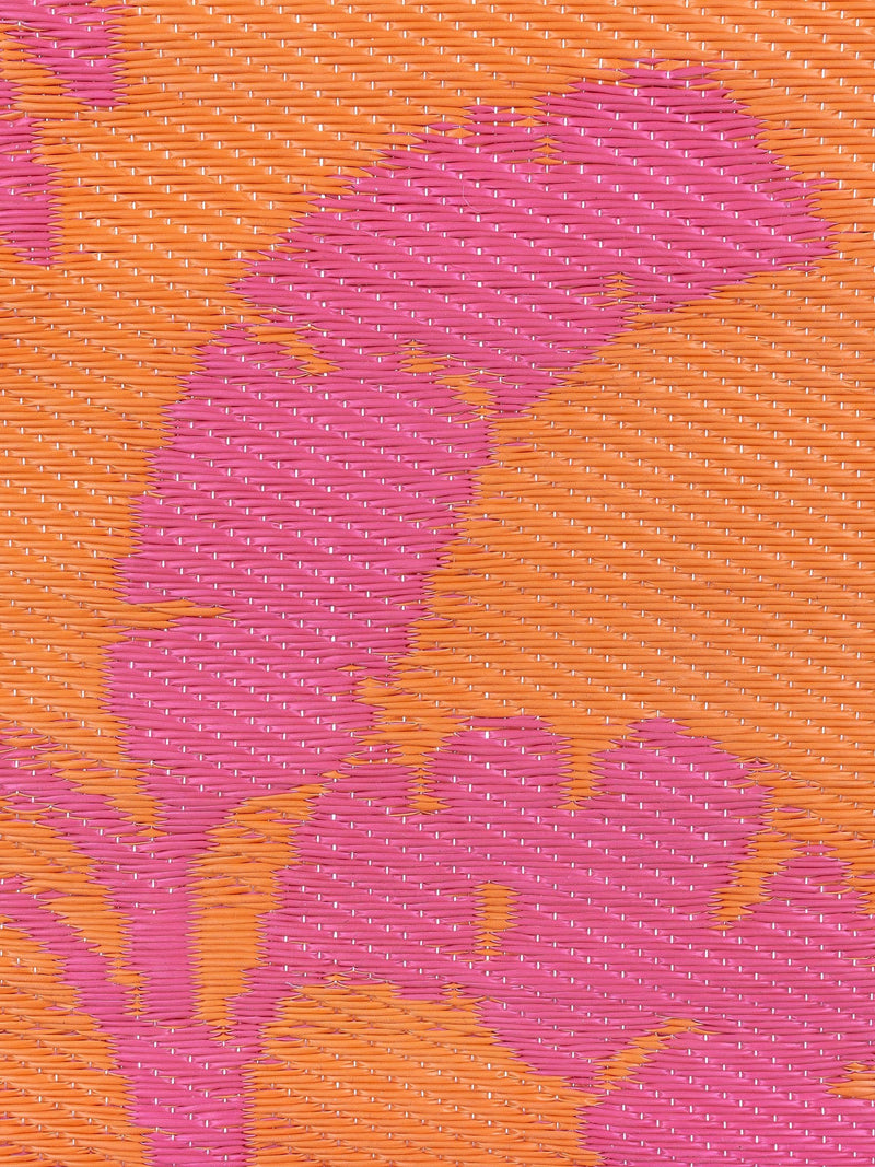 Furn Marula tropical outdoor rug in orange pink, UK version