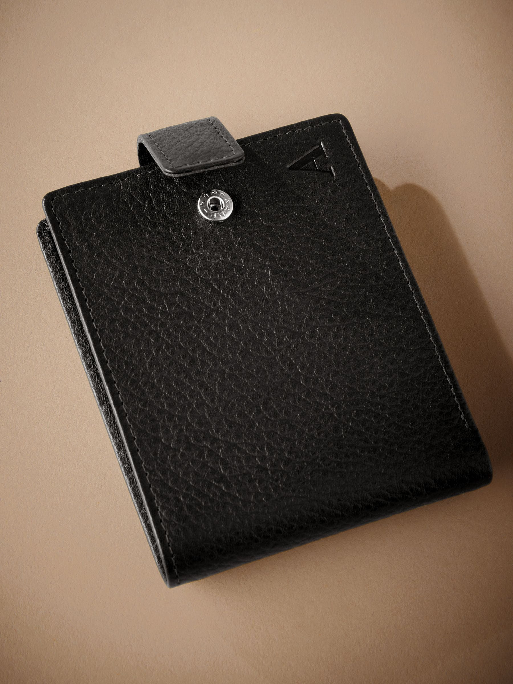 Black Signature Monogram leather wallet from British brand