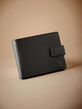 Black Signature Monogram leather wallet from British brand