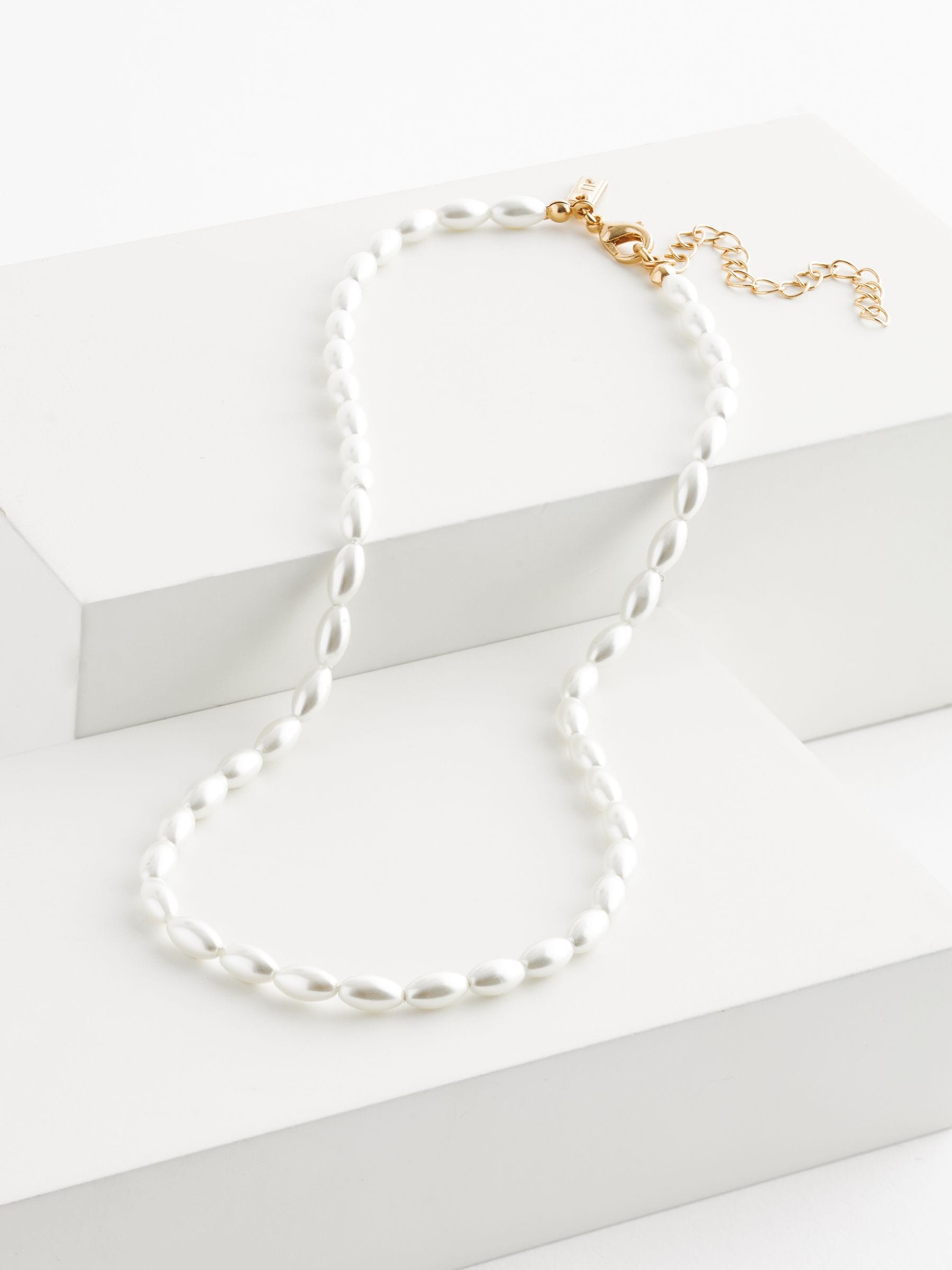 White glass pearl short necklace with gold-tone clasp, imported from the UK