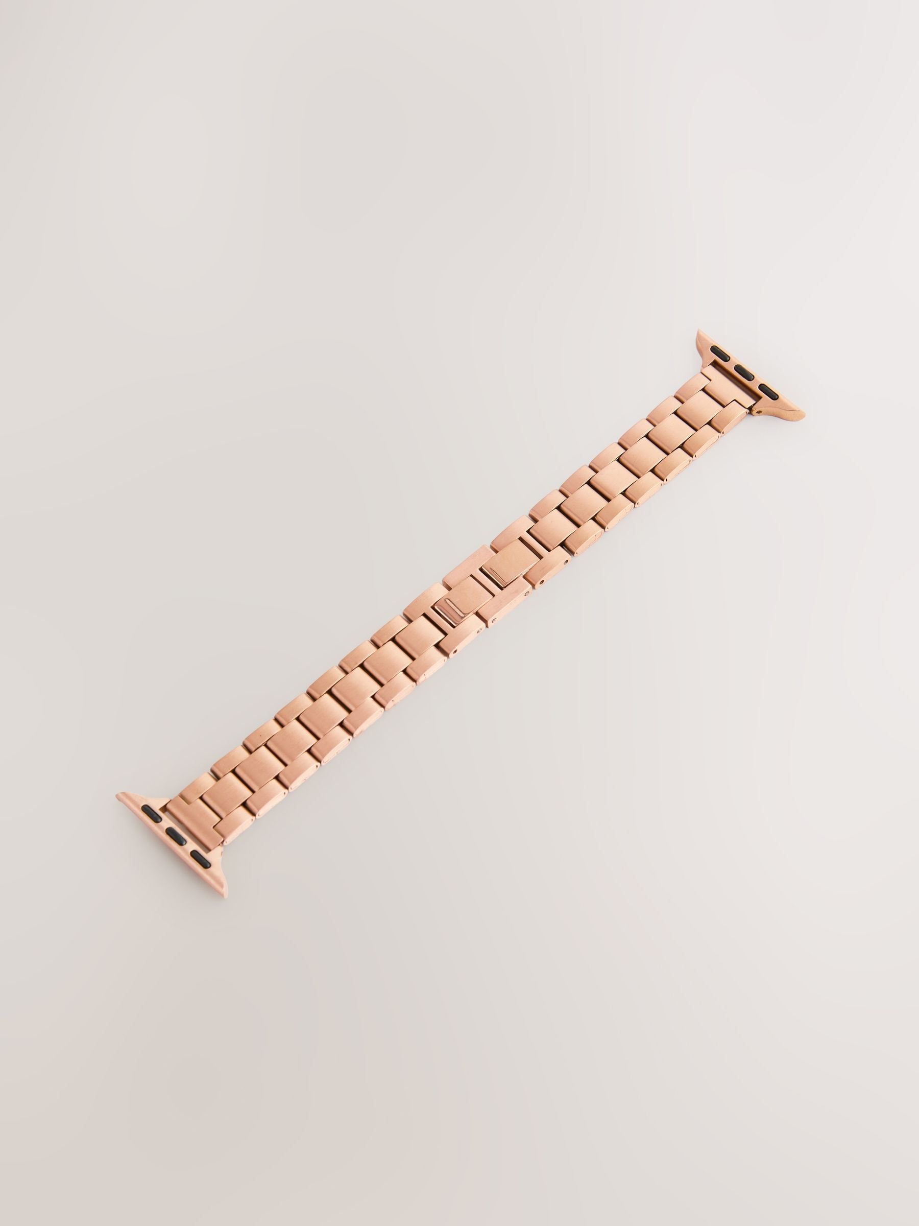 Rose gold stainless steel Apple watch strap, imported from the UK