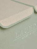 Sage green laundry sorter basket with embroidered detail - British product
