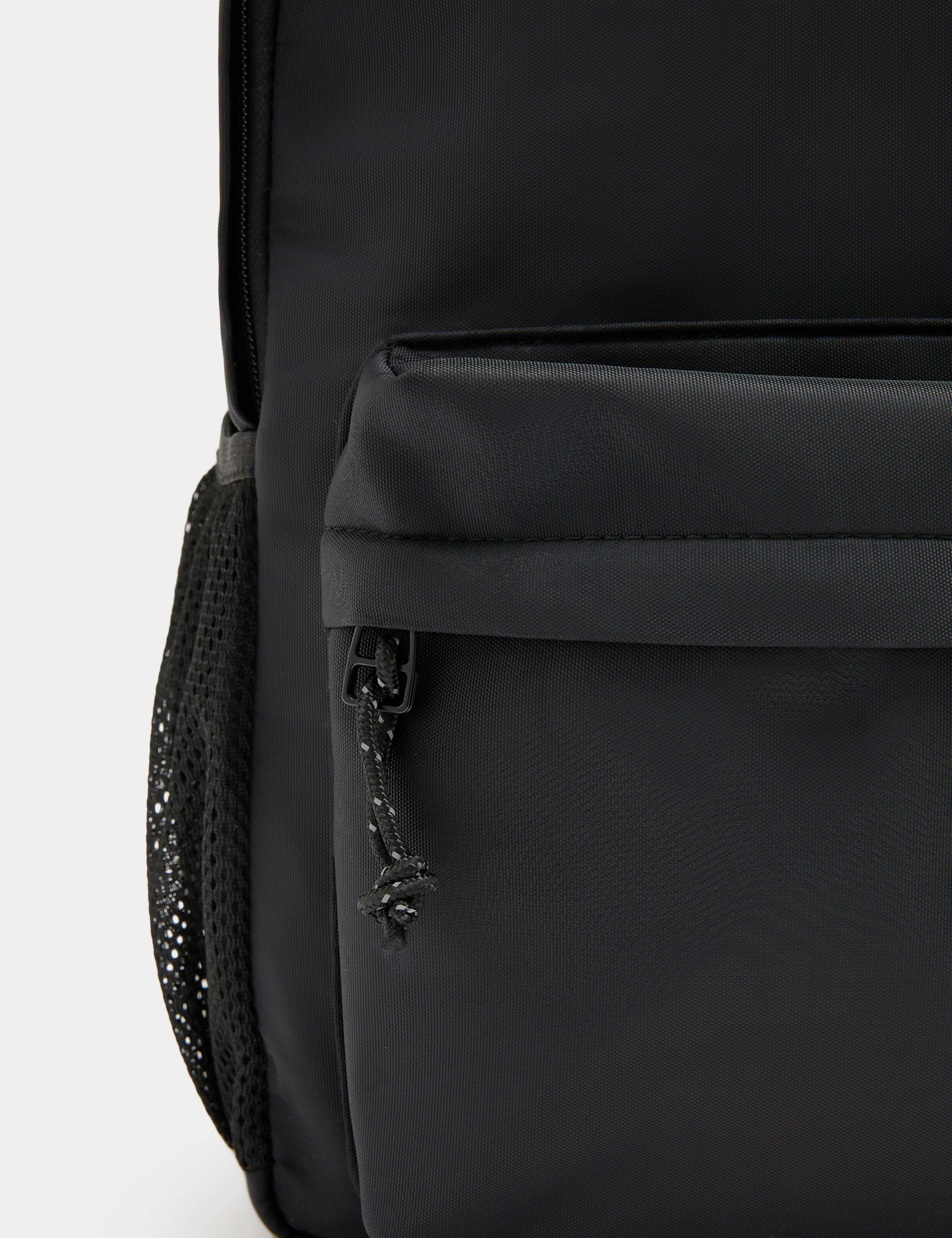 M&S smart backpack with zip fastening front pocket - British product