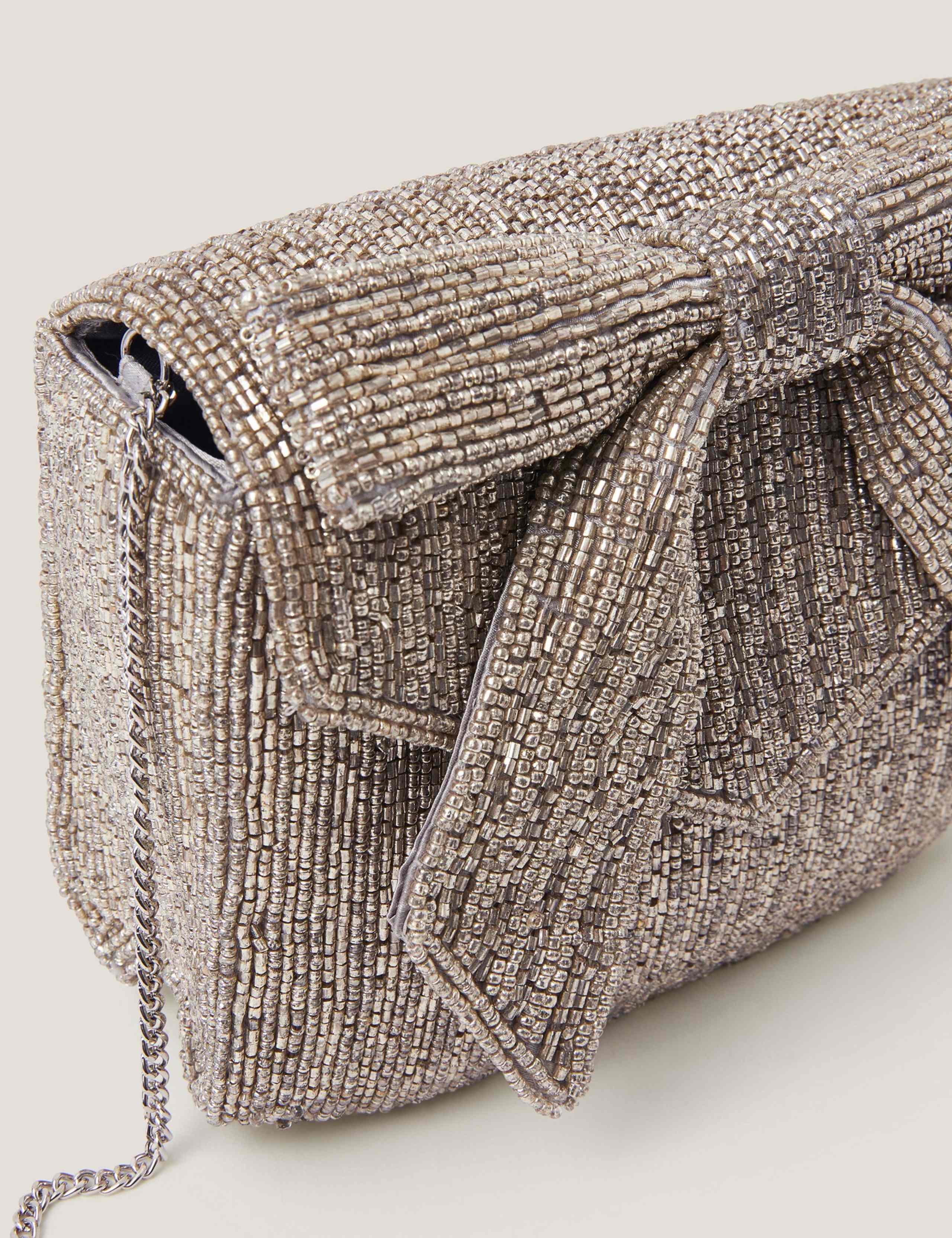 Monsoon Clutch mit Schleife und Kettenträger (britische Marke)