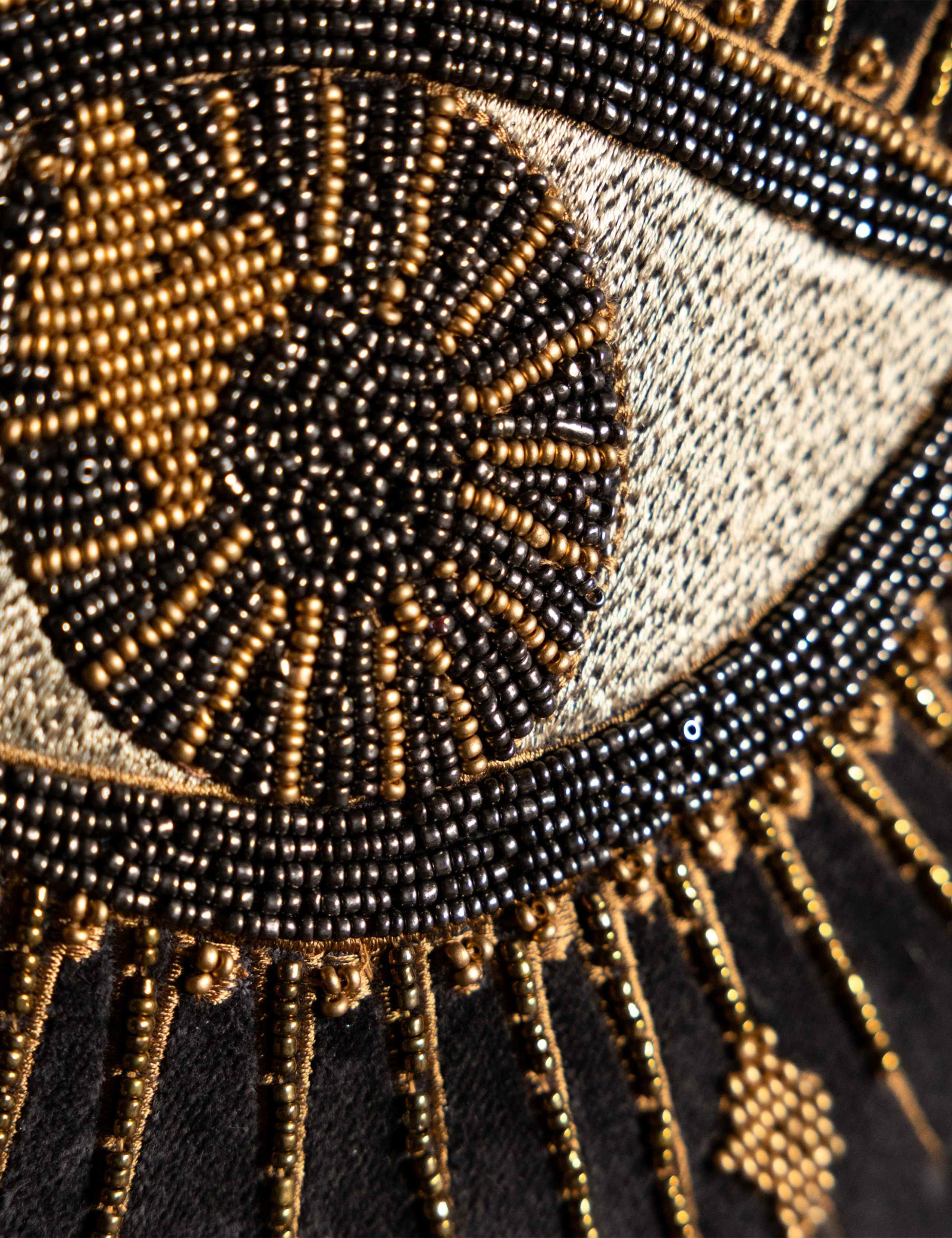 Rockett St George beaded velvet cushion with eye motif (British brand)