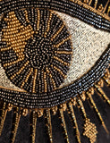 Rockett St George beaded velvet cushion with eye motif (British brand)