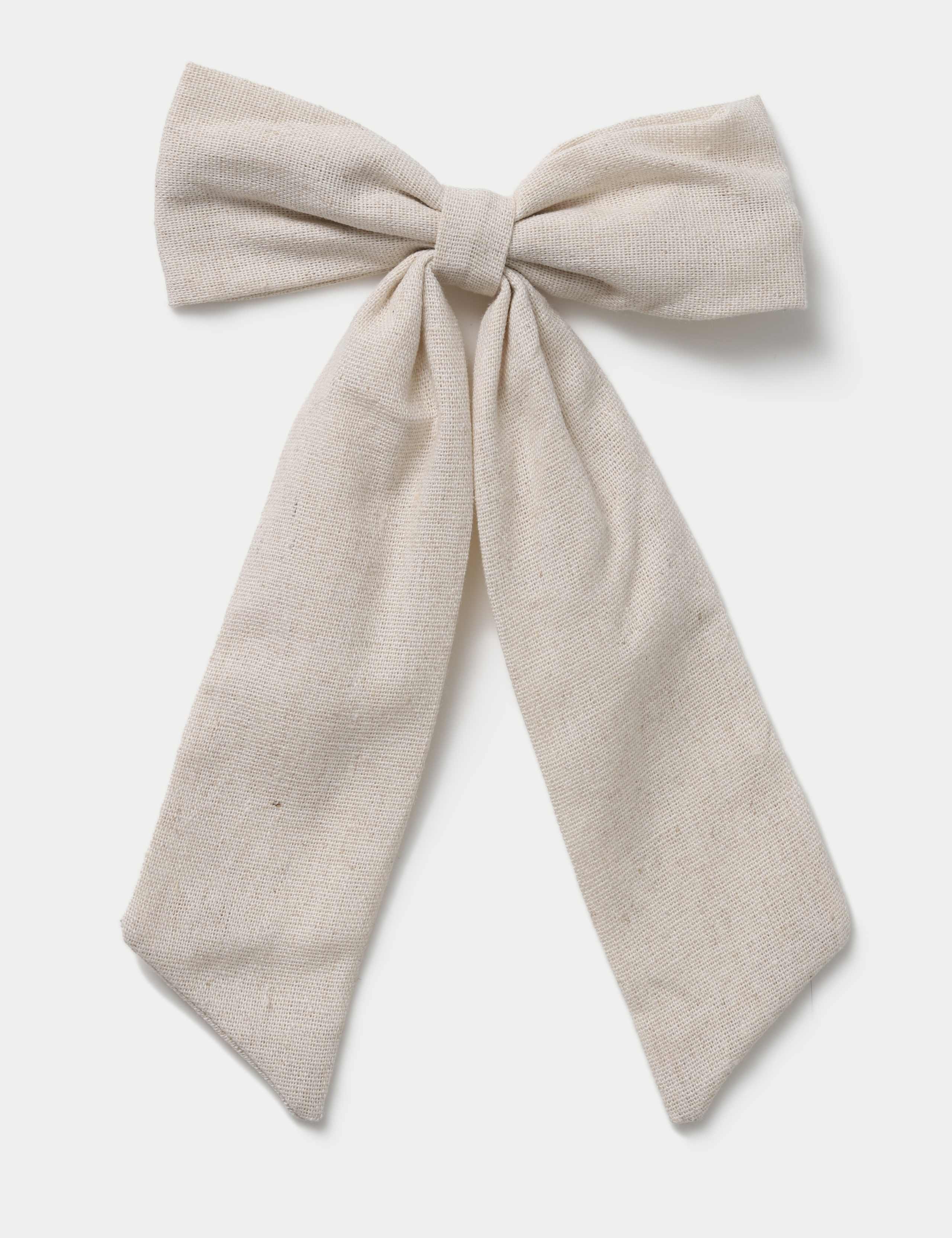Beige linen bow hair accessory, imported from the UK