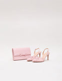 Phase Eight clutch bag with bow chain strap - British product