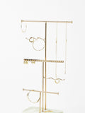 Oliver Bonas gold metal and marble wiggle jewellery stand, imported from the UK