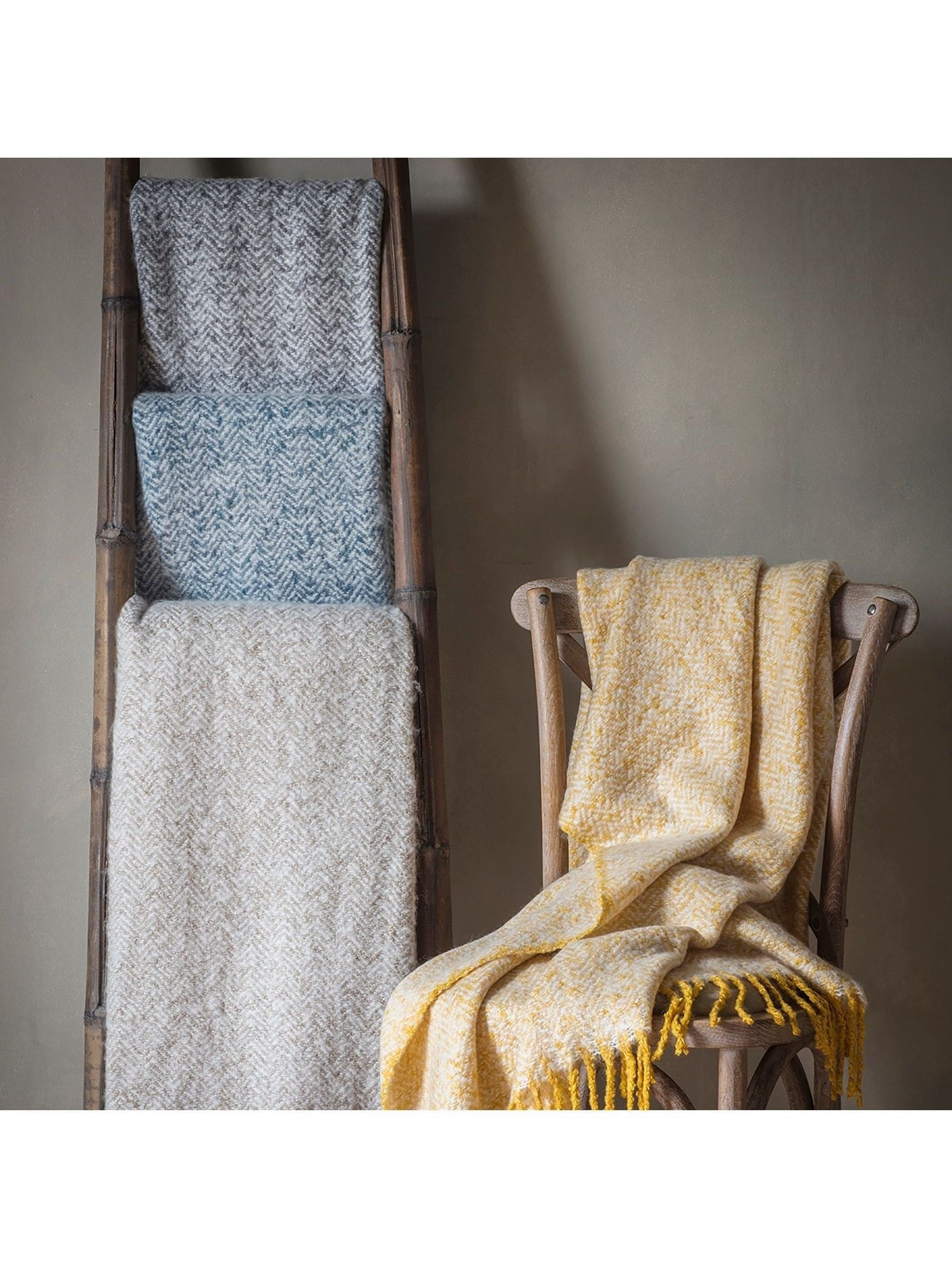 Gallery Home grey herringbone throw, imported from the UK