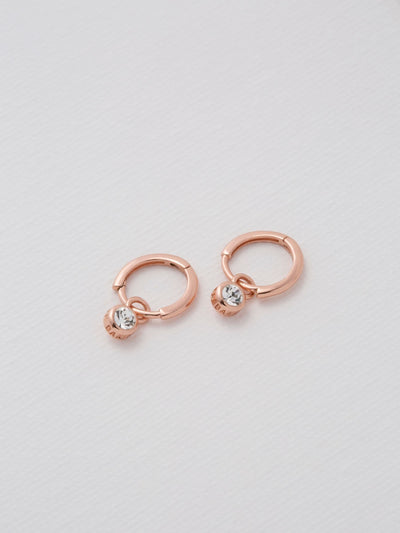 Boucles d'oreilles créoles Sinalaa cristal transparent or rose Ted Baker