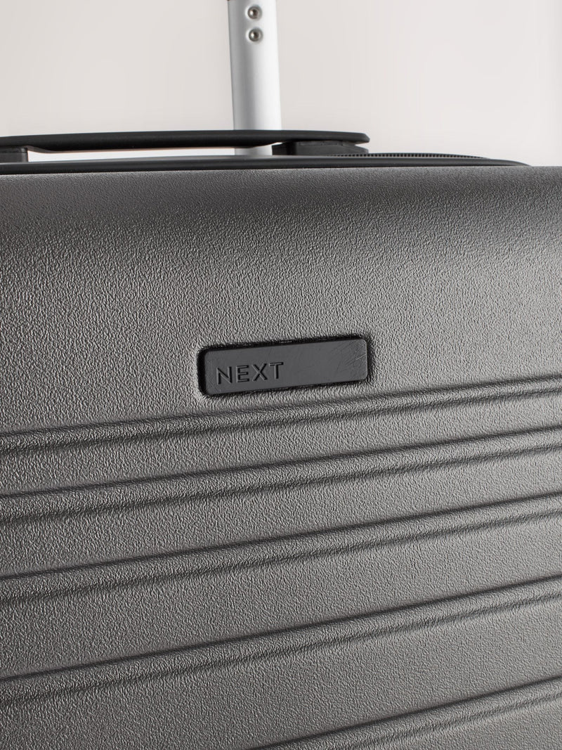 Next grey medium ABS suitcase with 360 wheels, UK version