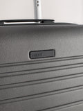 Next grey medium ABS suitcase with 360 wheels, UK version