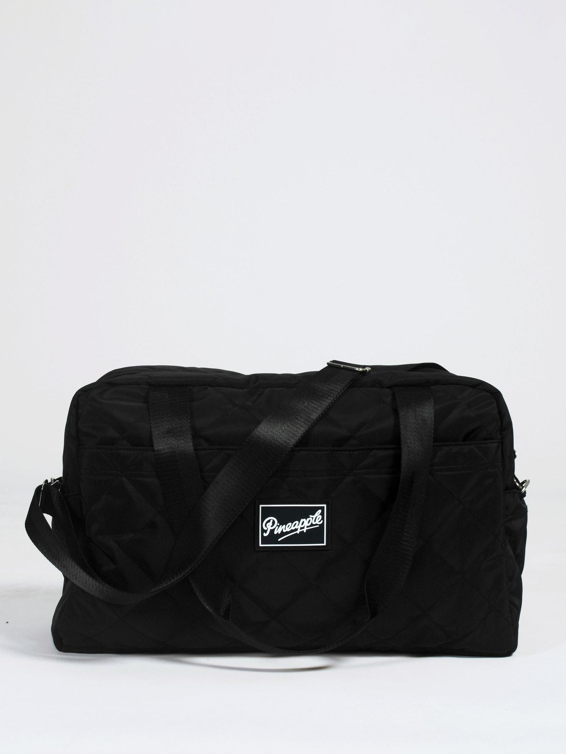 Pineapple black quilted holdall bag, imported from the UK
