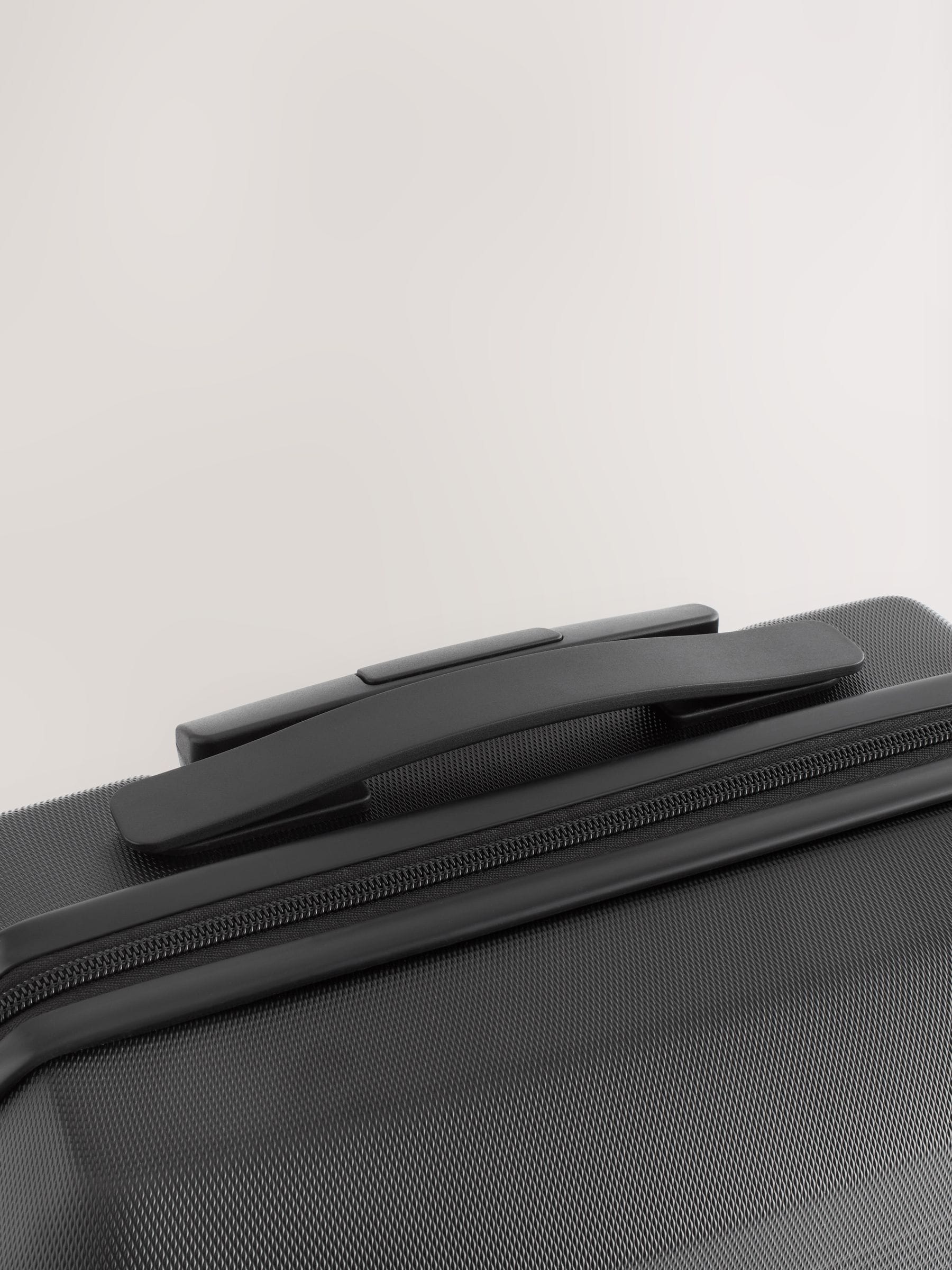 Black medium suitcase with ABS hard shell and TSA lock - British product
