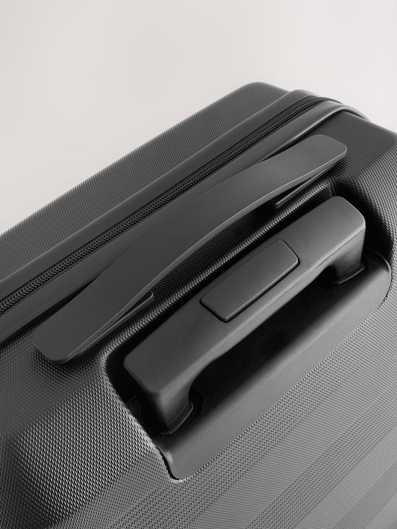 Black medium suitcase with ABS hard shell and TSA lock - British product