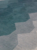 Asiatic Rugs teal blue hive wool rug, imported from the UK
