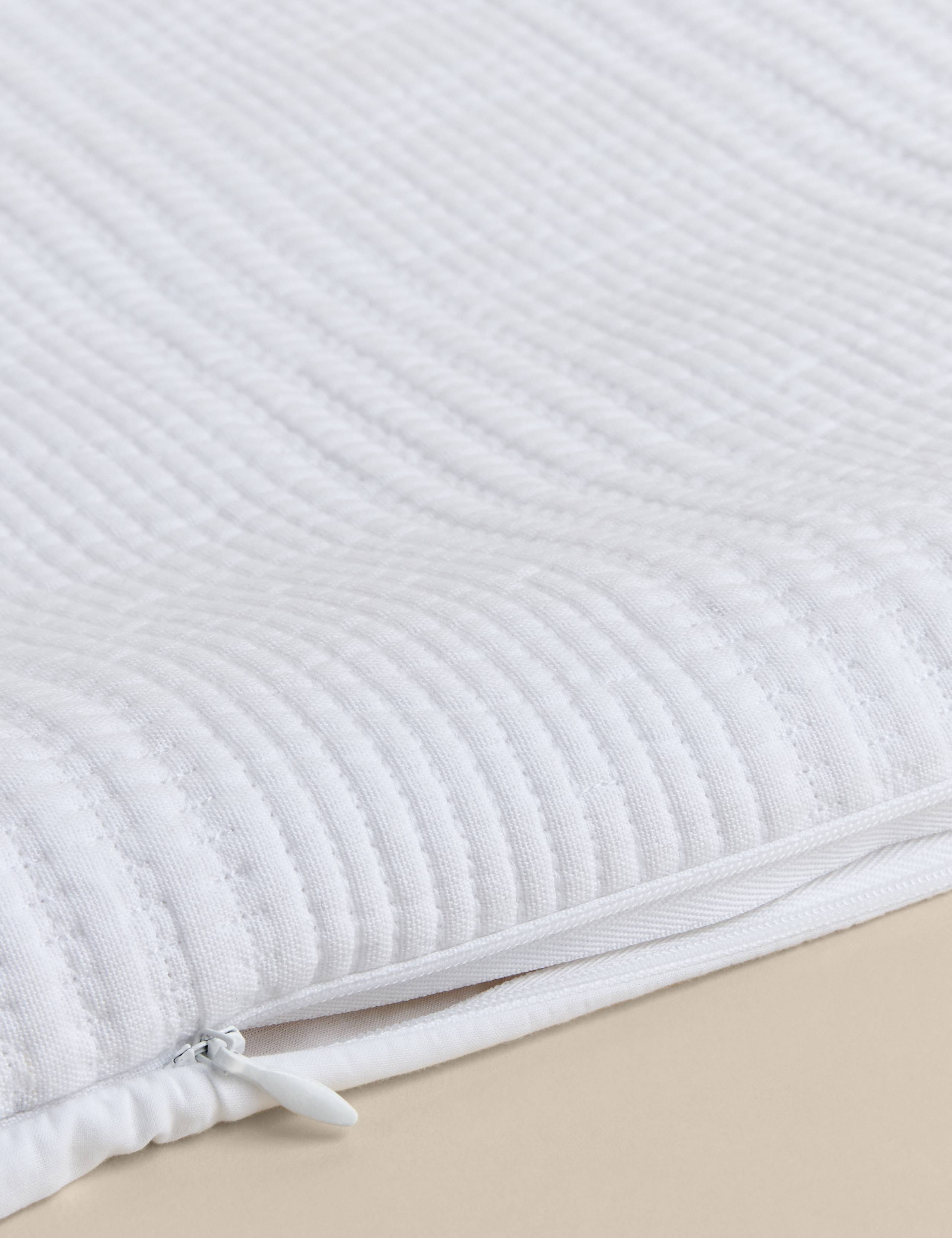 Decorative cushion with cotton rich fabric and striped design (British brand)