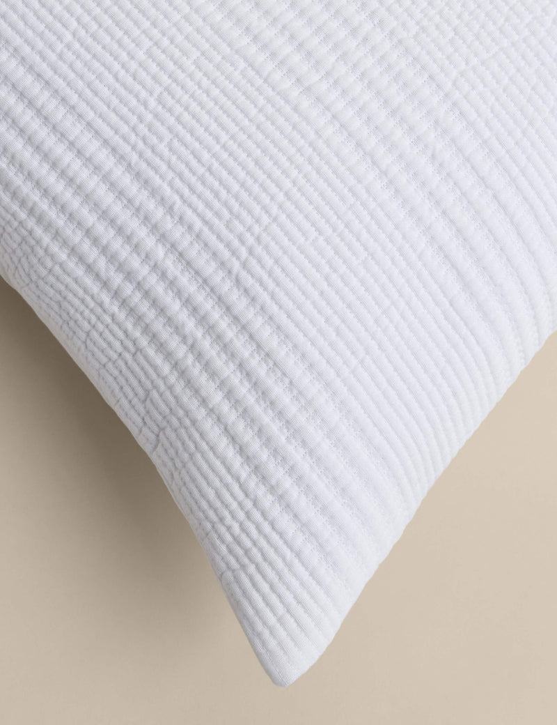 Decorative cushion with cotton rich fabric and striped design (British brand)