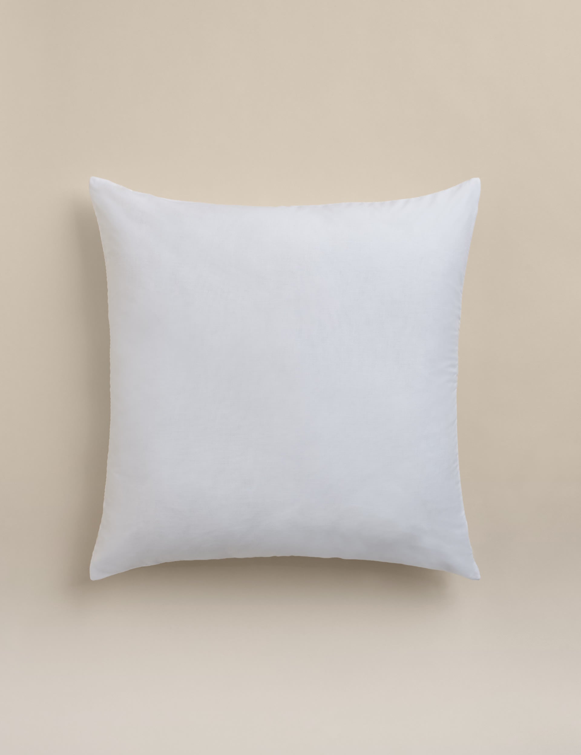 Decorative cushion with cotton rich fabric and striped design (British brand)