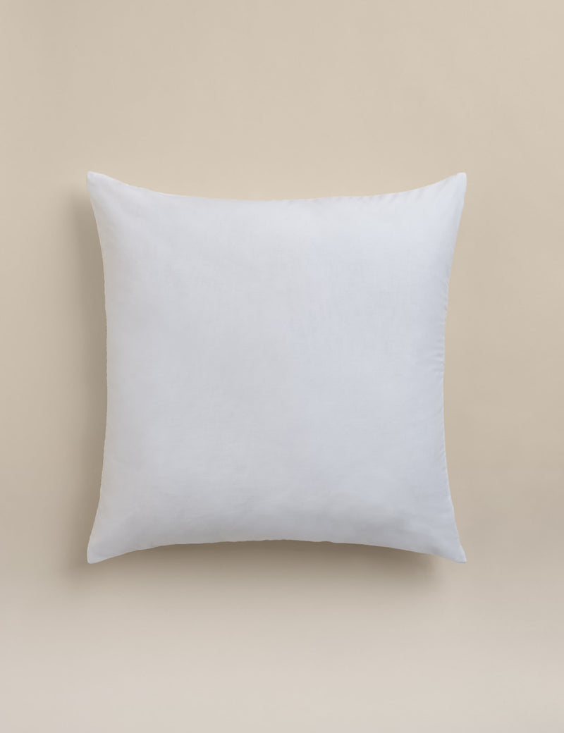 Decorative cushion with cotton rich fabric and striped design (British brand)