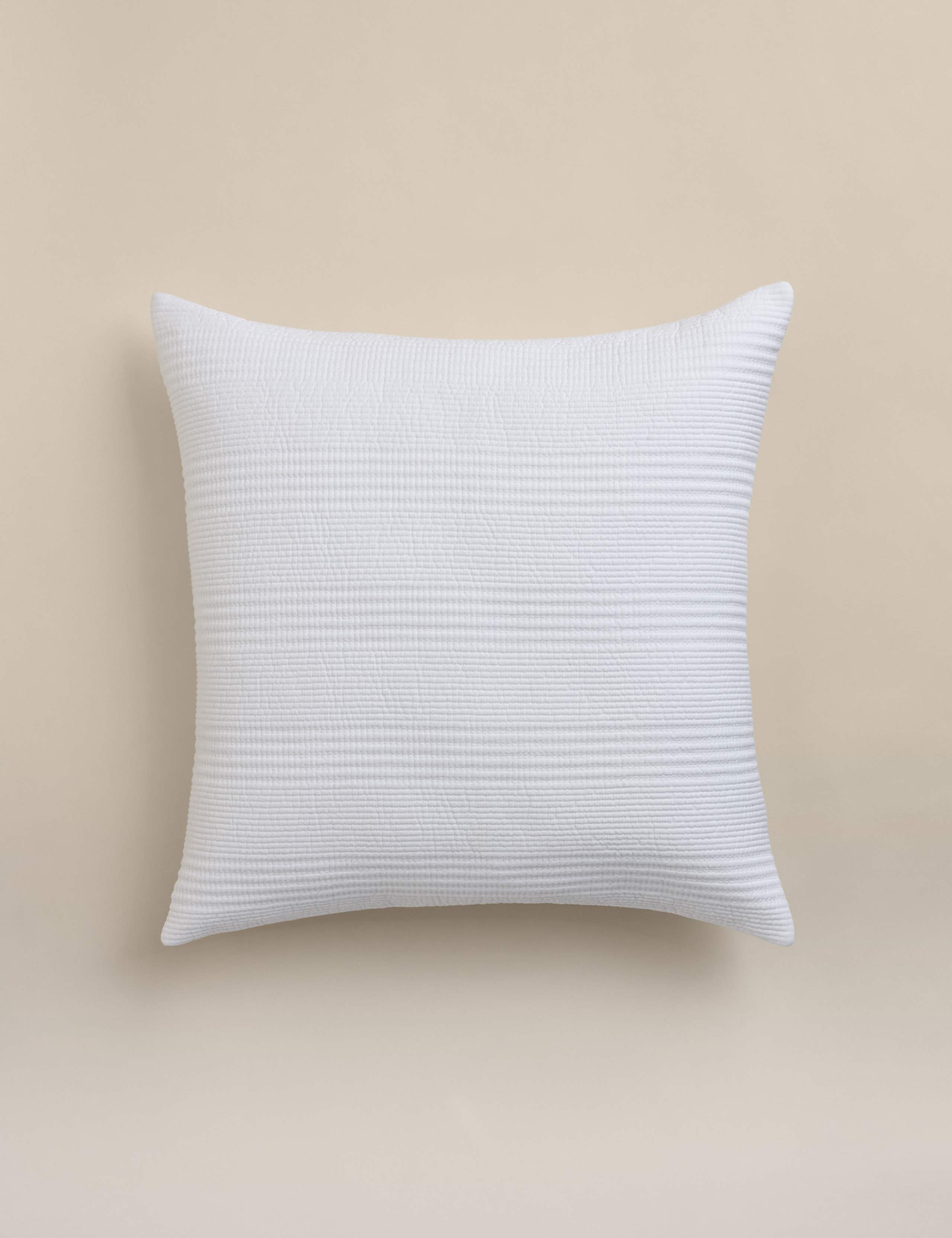 Decorative cushion with cotton rich fabric and striped design (British brand)