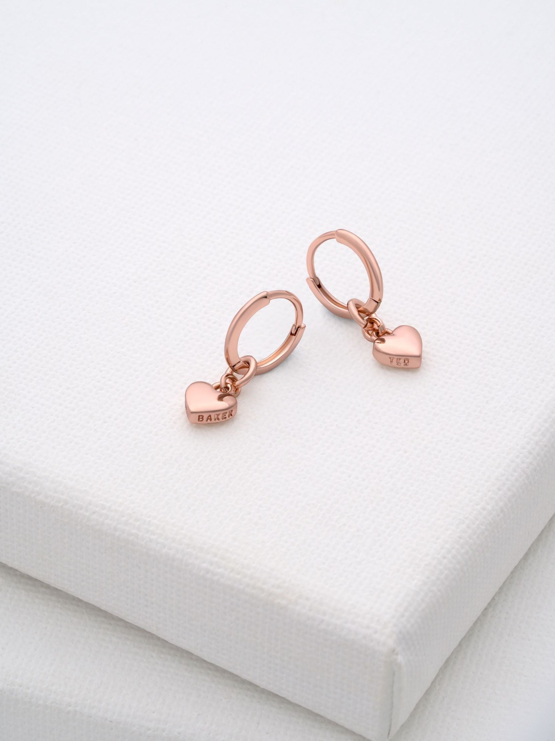 Ted Baker Tiny Heart Huggie Earrings in Gold Tone Plain Metal