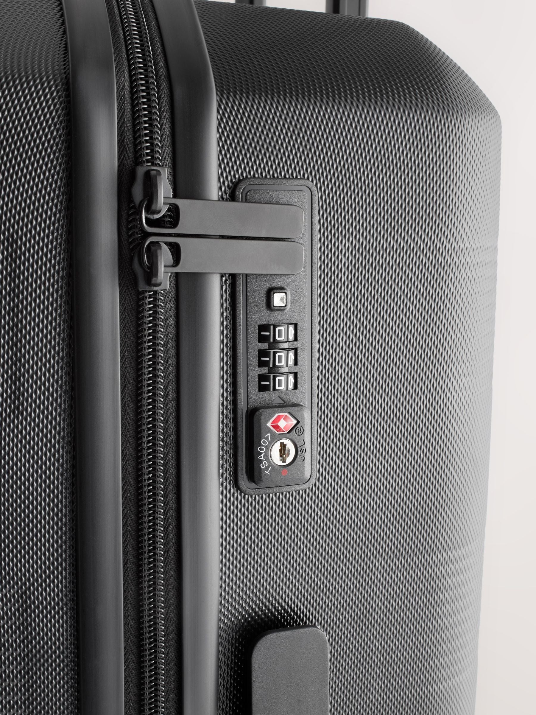 Black medium suitcase with ABS hard shell and TSA lock - British product