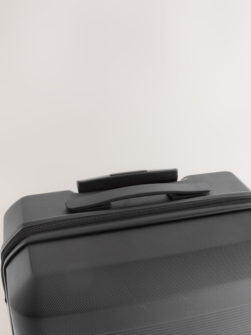 Black medium suitcase with ABS hard shell and TSA lock - British product