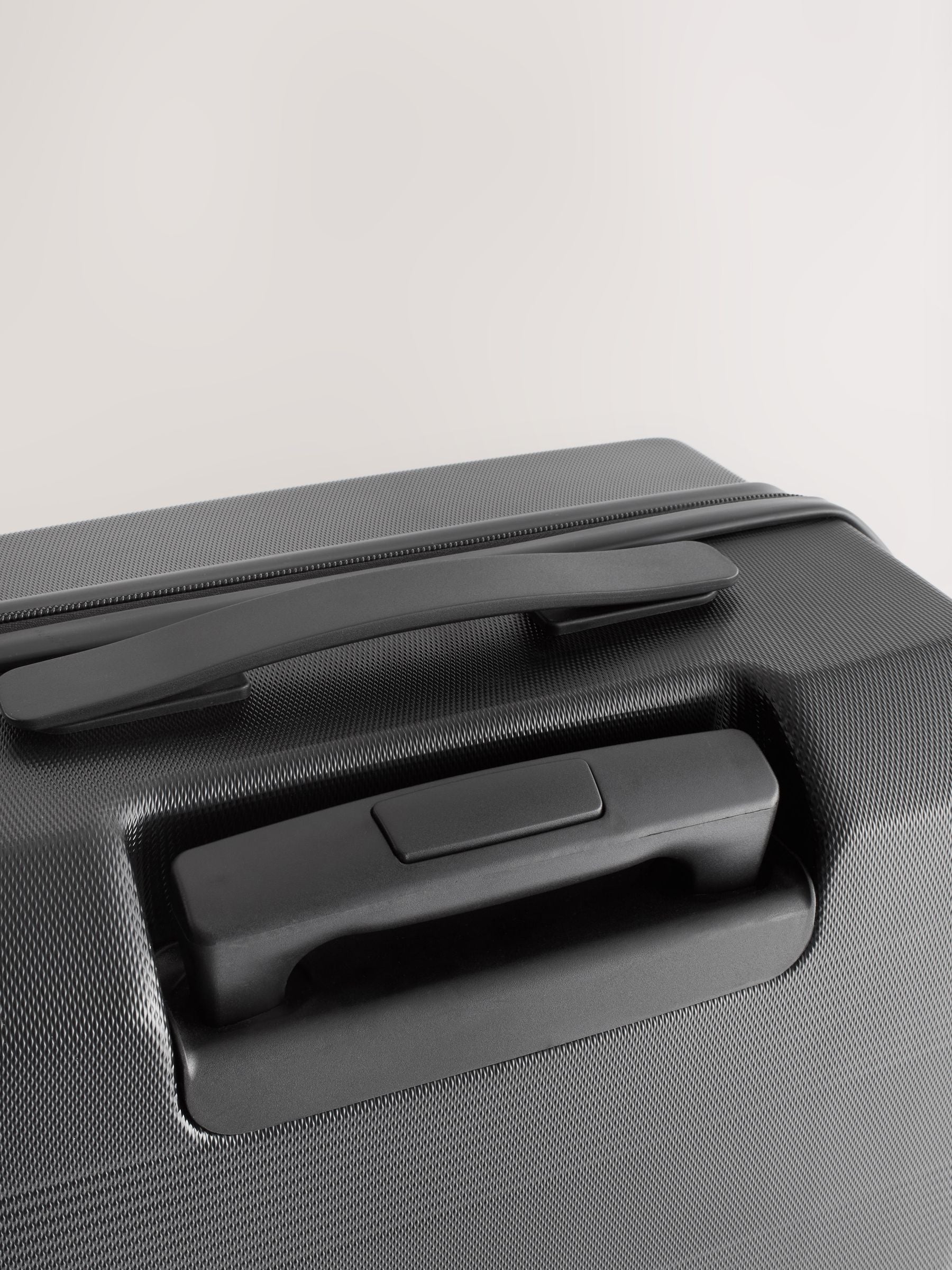 Black medium suitcase with ABS hard shell and TSA lock - British product