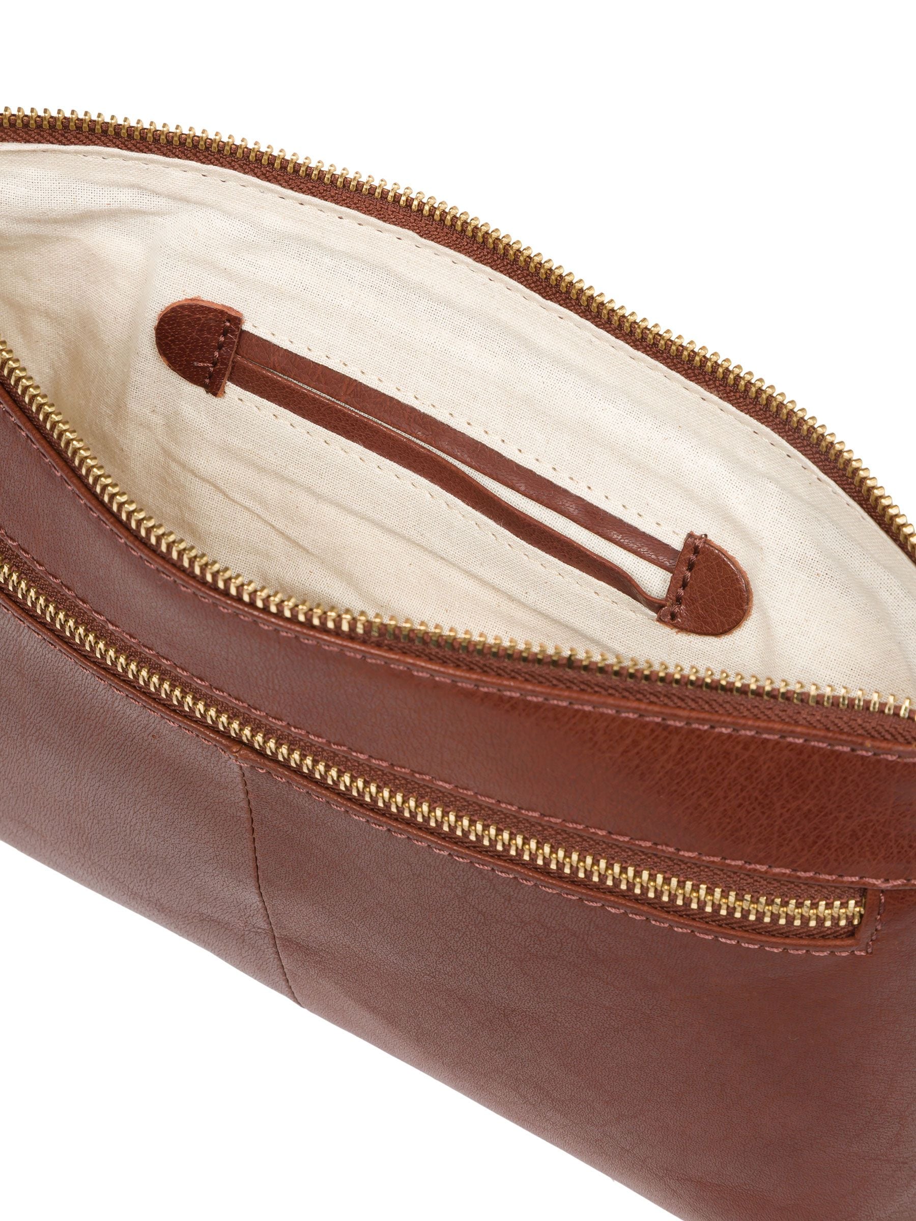 Conkca London leather clutch bag in conker brown, imported from the UK