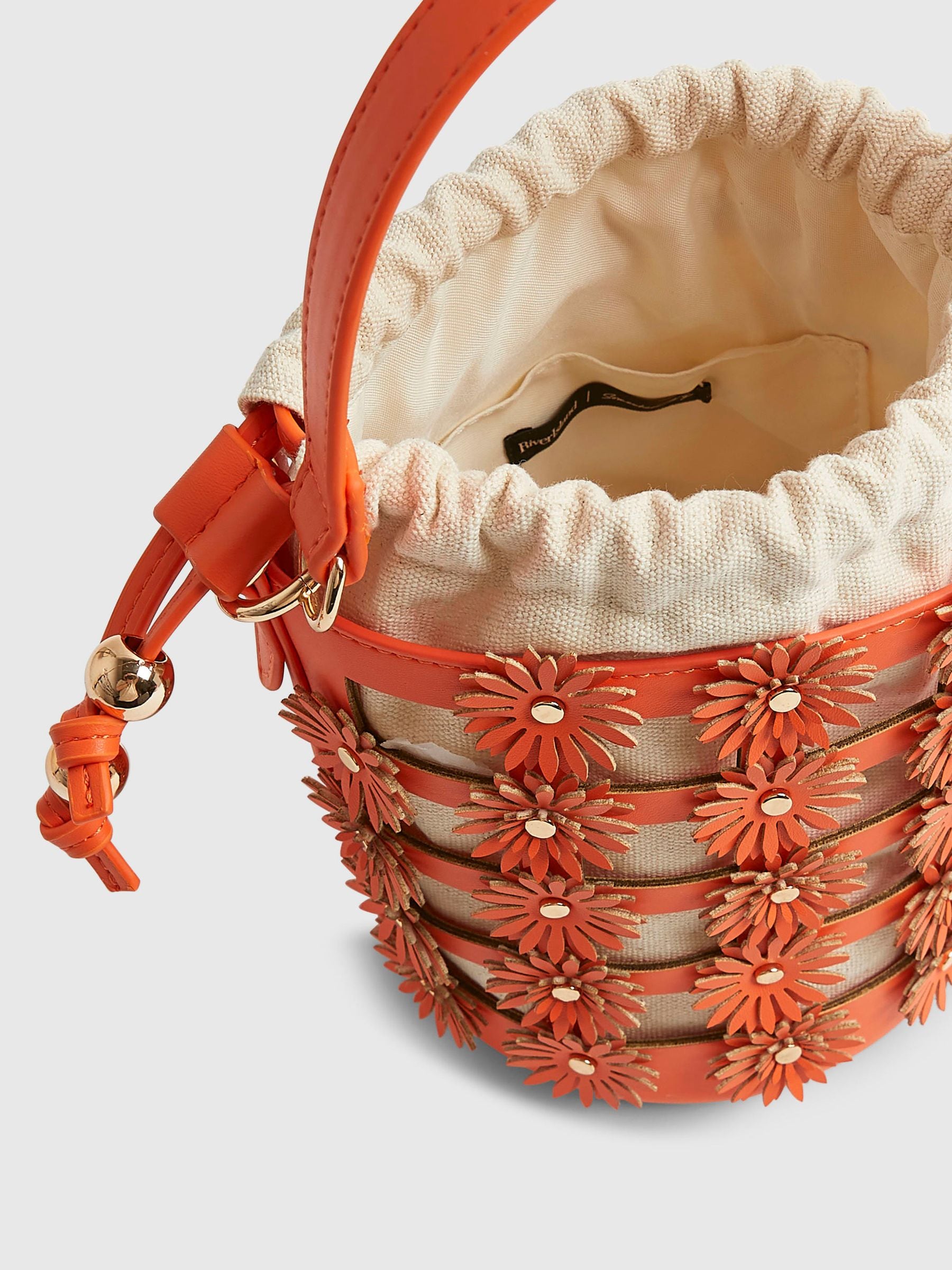 River Island orange 3D floral cut out bucket bag - British product