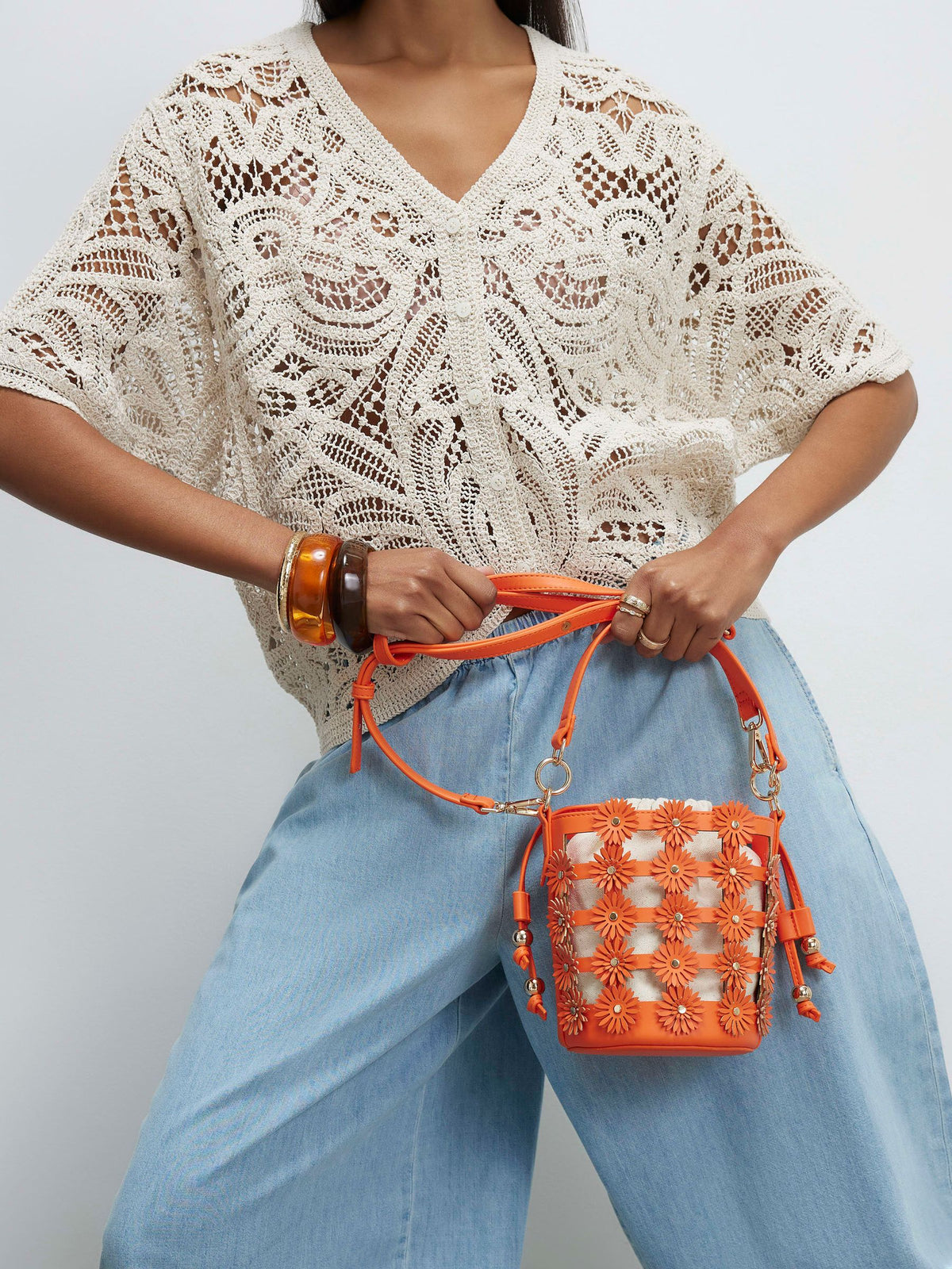 River Island orange 3D floral cut out bucket bag - British product