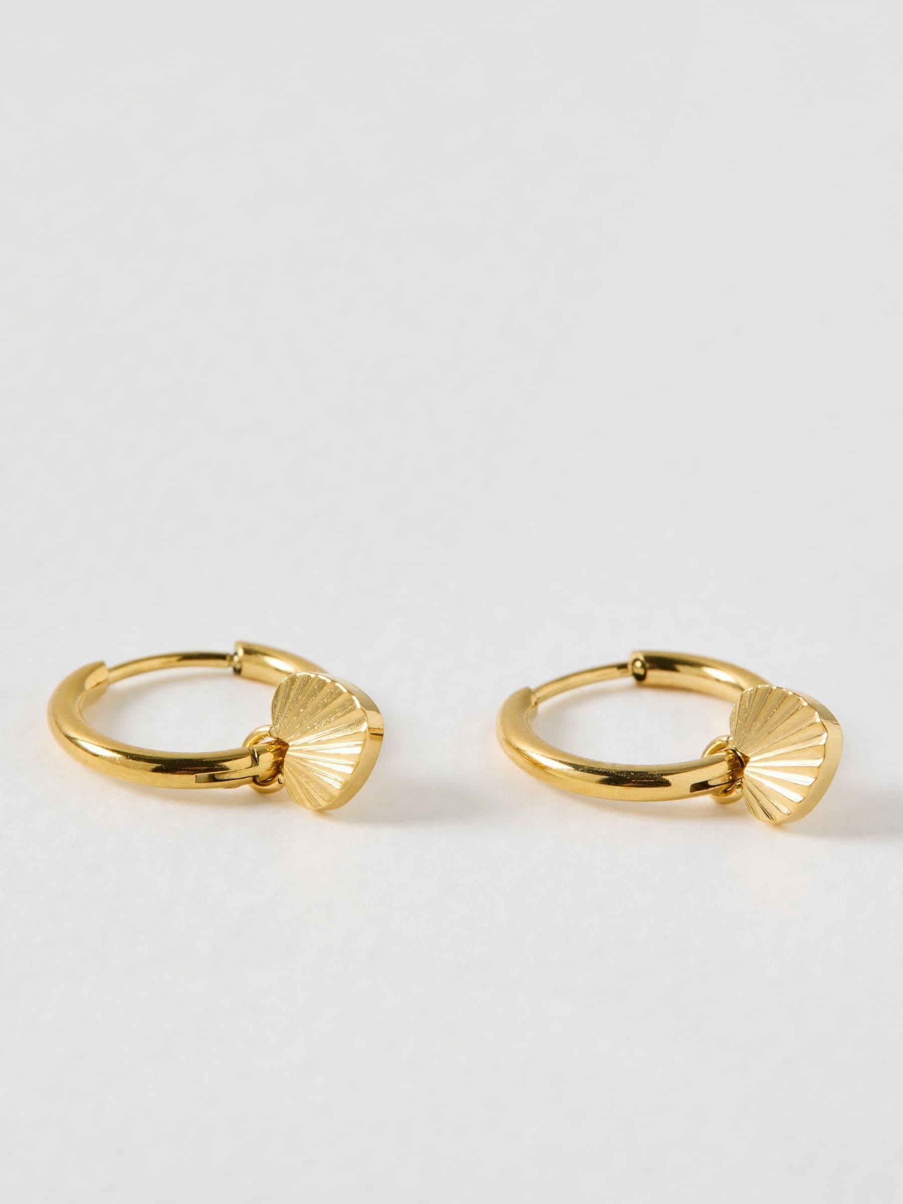 Oliver Bonas gold hoop earrings etched heart charm (British brand)